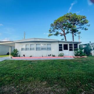 Foto de propiedad en 6308 S Ash Lane, Lantana, FL 33462 Lantana con MLS# 