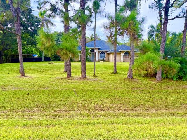 Foto de propiedad en 12377 77TH Place N, The Acreage, FL 33412 The Acreage con MLS# 