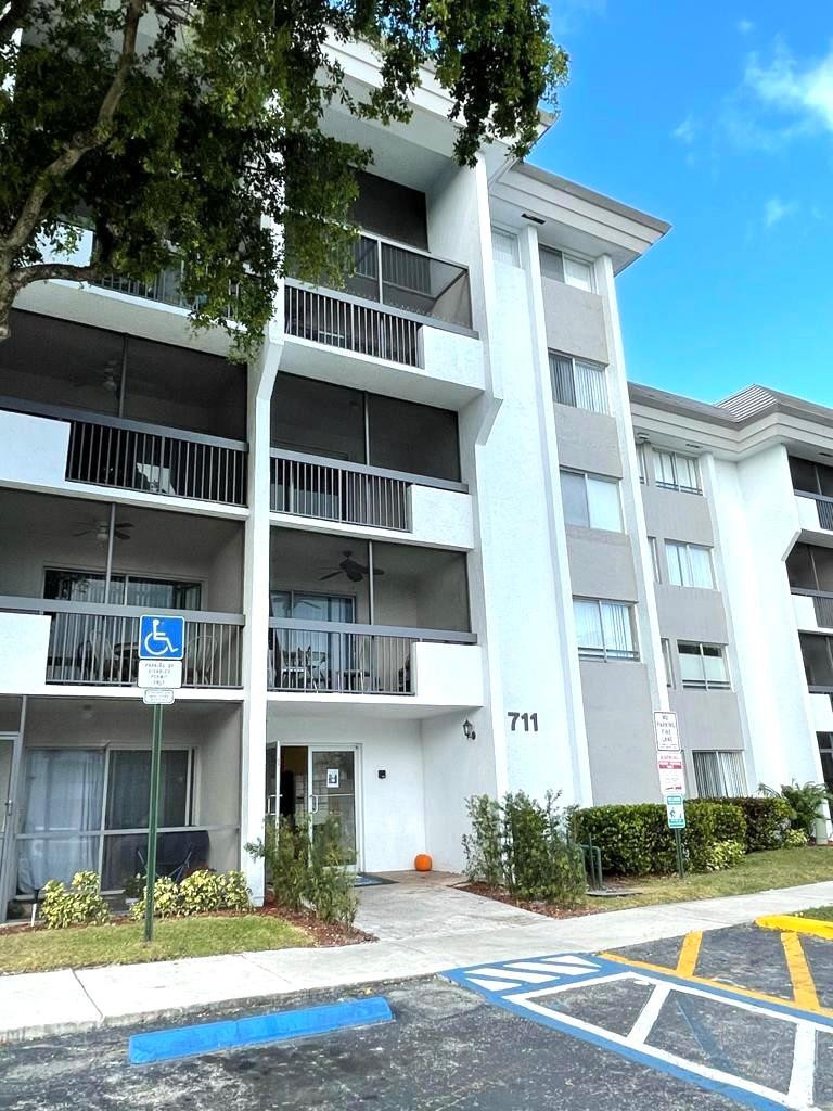 Foto de propiedad en 711 N PINE ISLAND Road 305, Plantation, FL 33324 Plantation con MLS# 