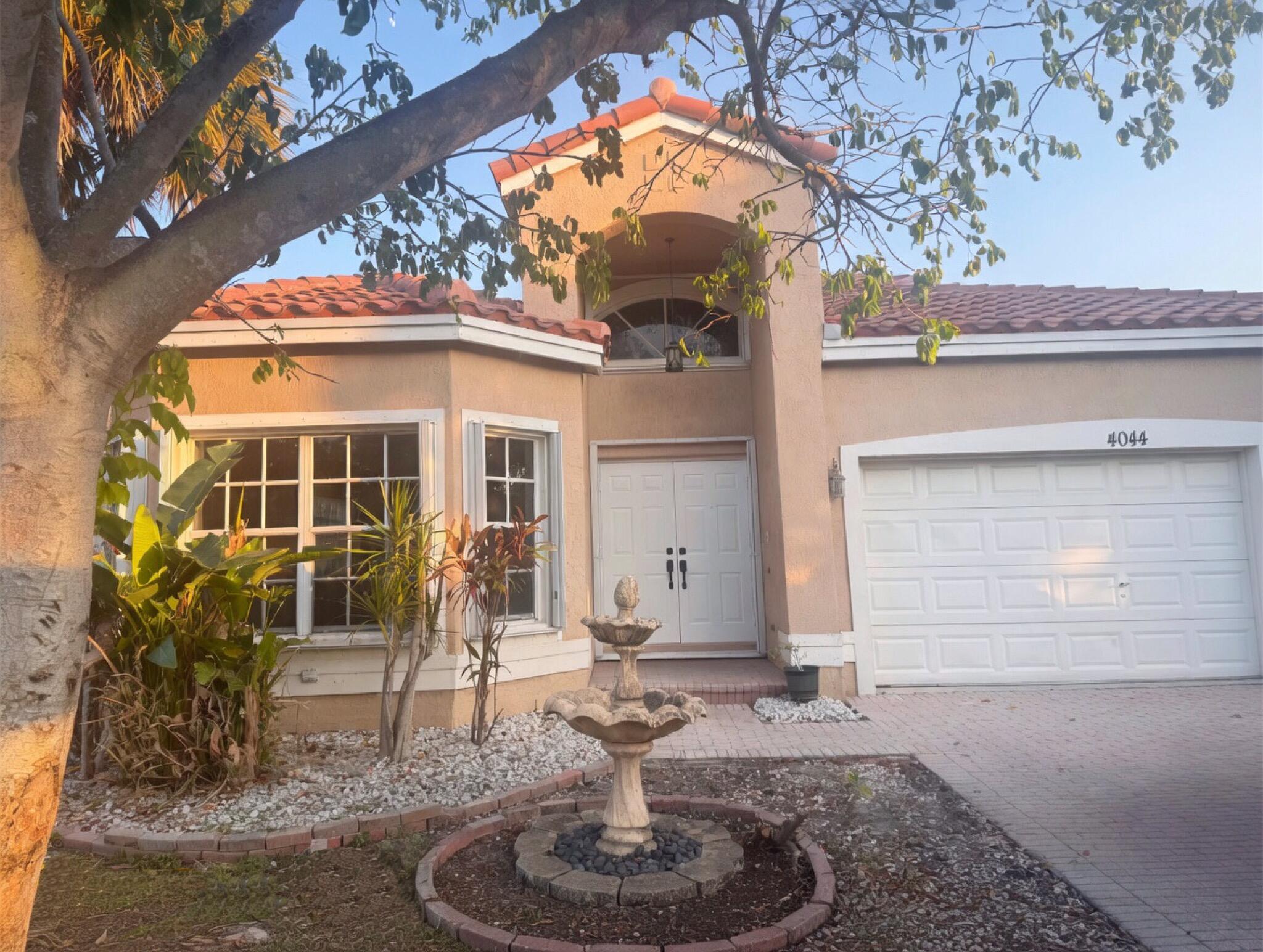 Foto de propiedad en 4044 NW 62ND Court, Coconut Creek, FL 33073 Coconut Creek con MLS# 