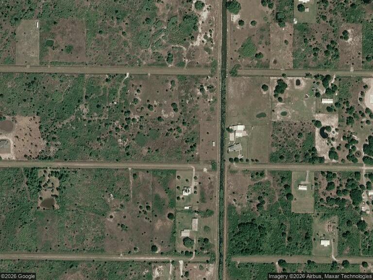 Foto de propiedad en 15261 NW 262ND Street, Okeechobee, FL 34972 Okeechobee con MLS# 