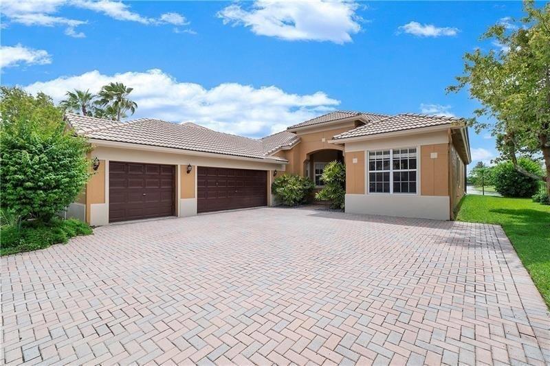 Foto de propiedad en 7008 NW 111TH Terrace, Parkland, FL 33076 Parkland con MLS# 