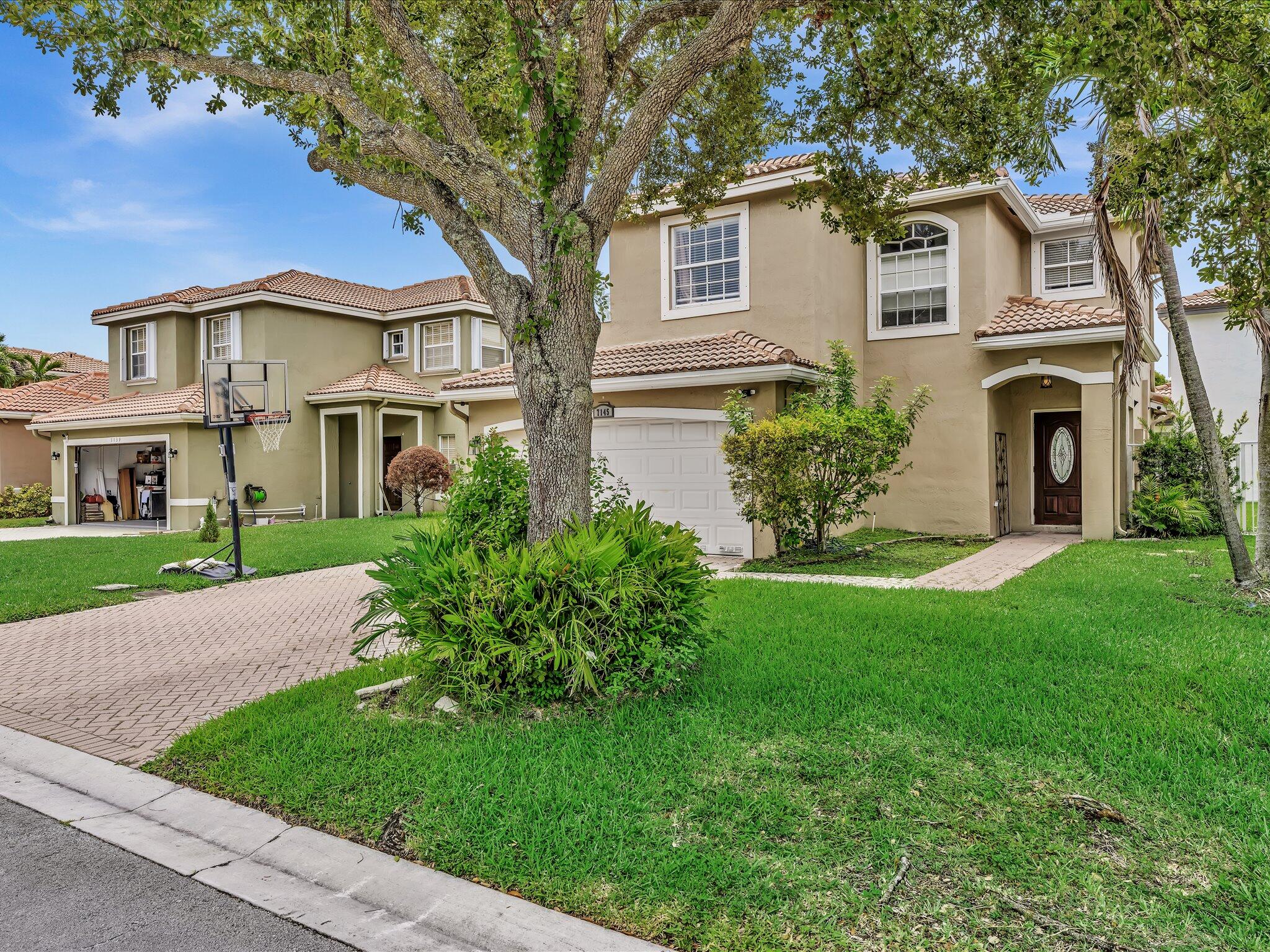 Foto de propiedad en 7145 CRESCENT CREEK Place, Coconut Creek, FL 33073 Coconut Creek con MLS# 