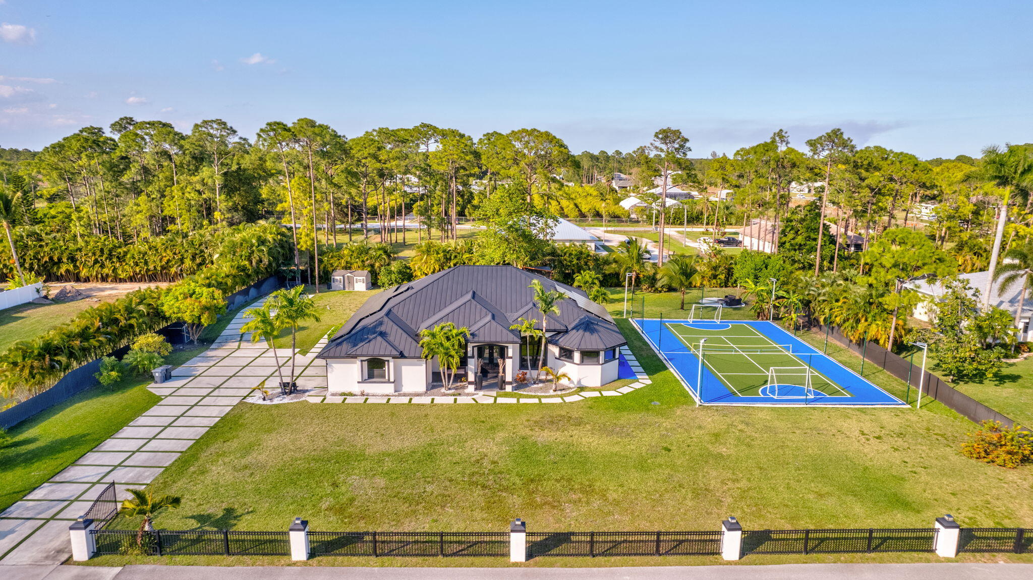 Foto de propiedad en 13803 CITRUS GROVE Boulevard, The Acreage, FL 33412 The Acreage con MLS# 