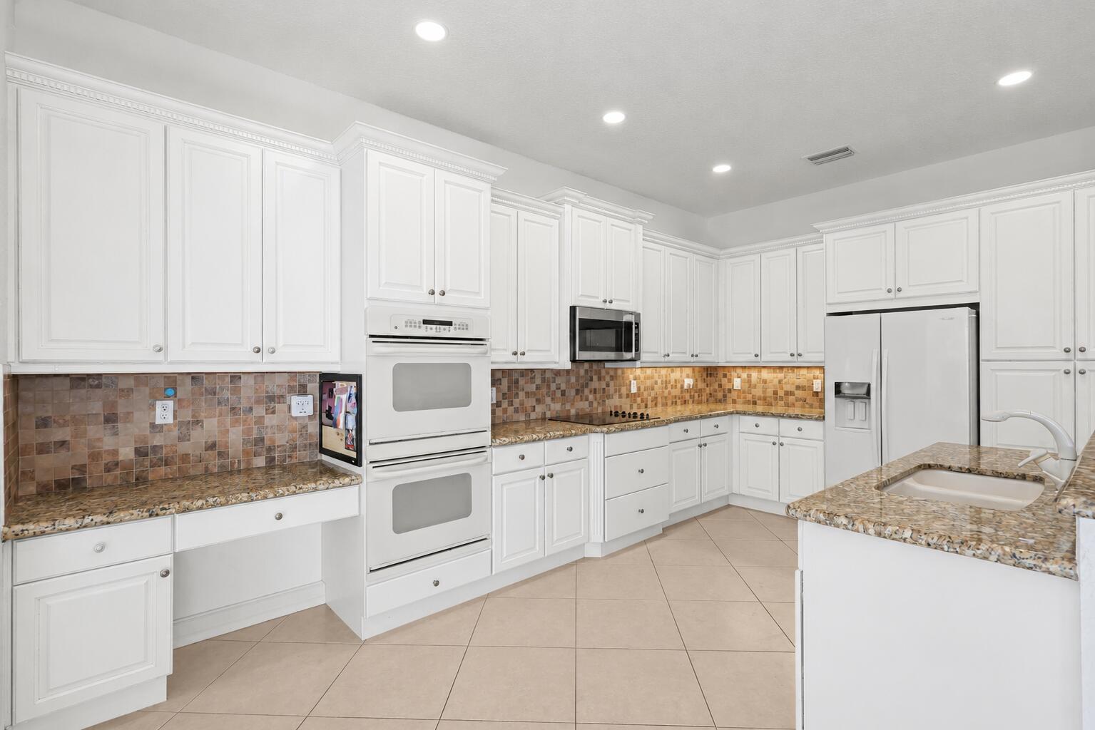 Foto de propiedad en 11394 MILLPOND GREENS Drive, Boynton Beach, FL 33473 Boynton Beach con MLS# 