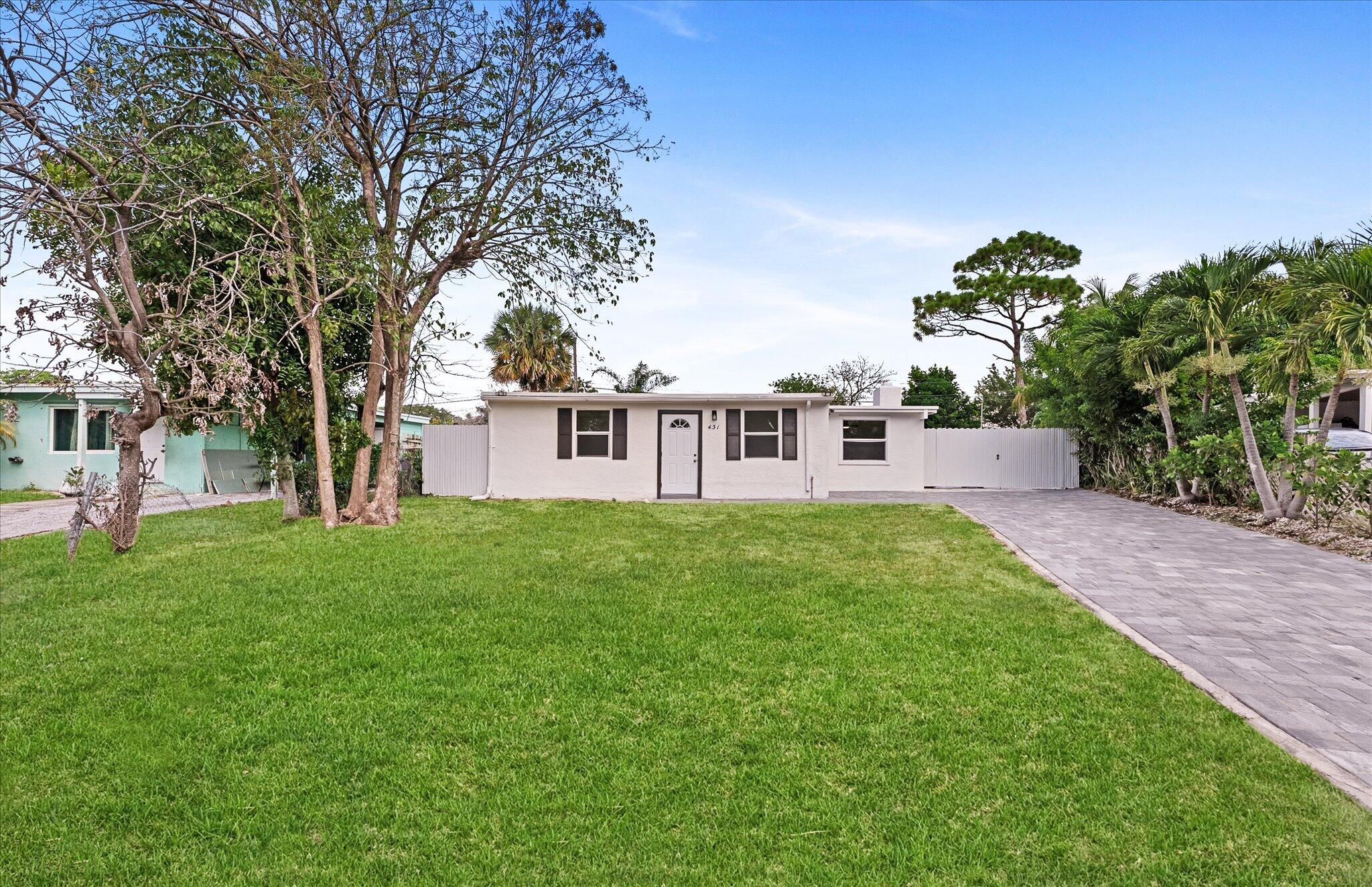 Foto de propiedad en 431 Ficus Tree Drive, Lantana, FL 33462 Lantana con MLS# 