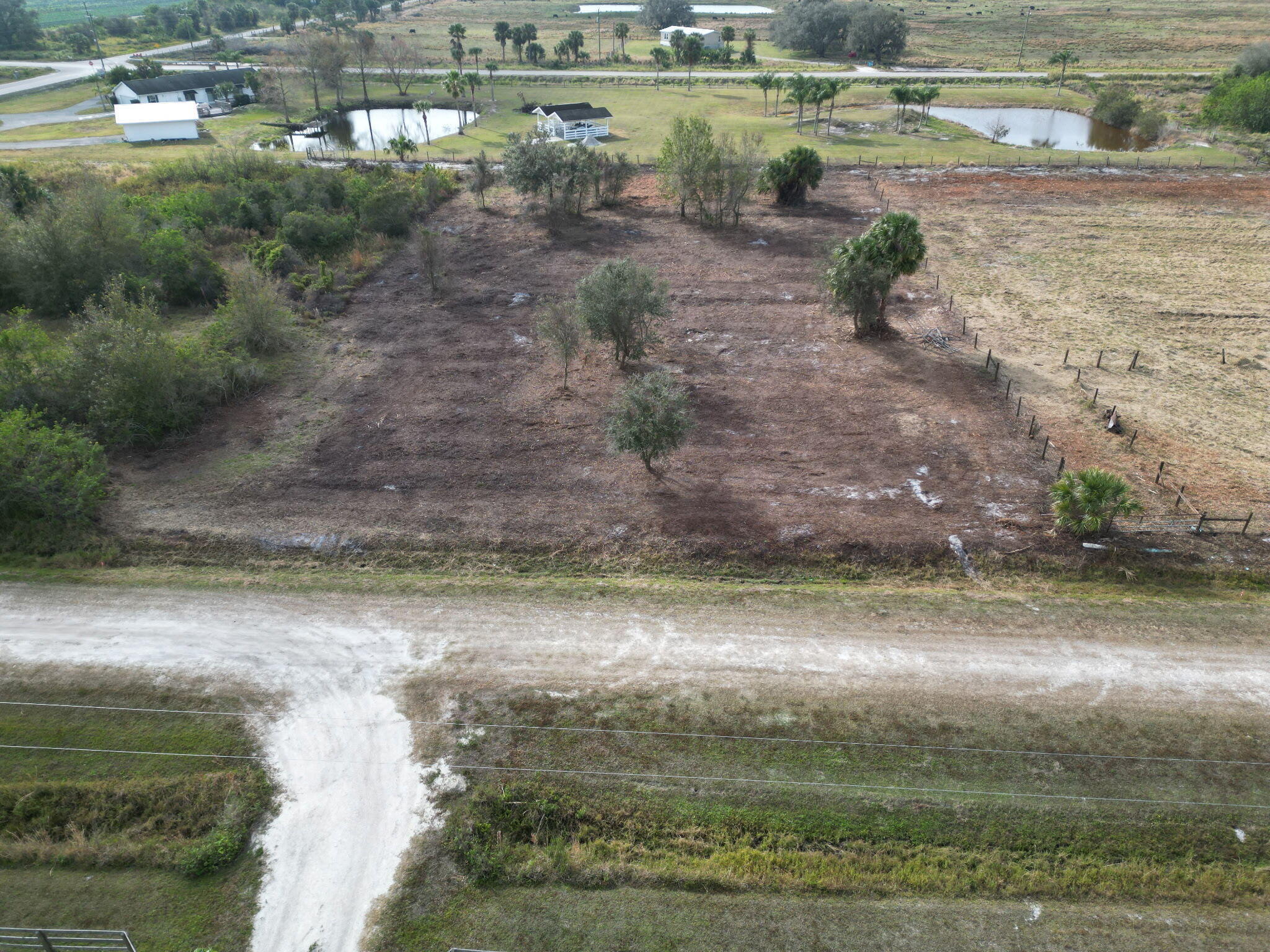Foto de propiedad en 14510 NW 242ND Street, Okeechobee, FL 34972 Okeechobee con MLS# 