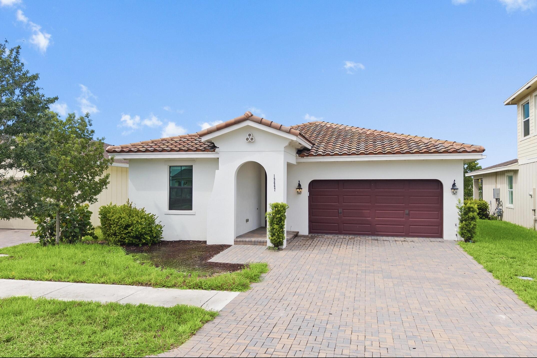 Foto de propiedad en 19667 Rugged Trunk Trail, Loxahatchee, FL 33470 Loxahatchee con MLS# 