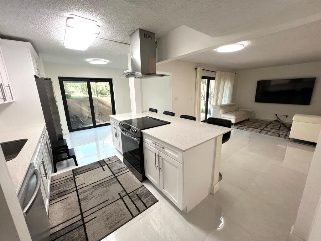 Foto de propiedad en 3810 NW 23RD Court, Coconut Creek, FL 33066 Coconut Creek con MLS# 