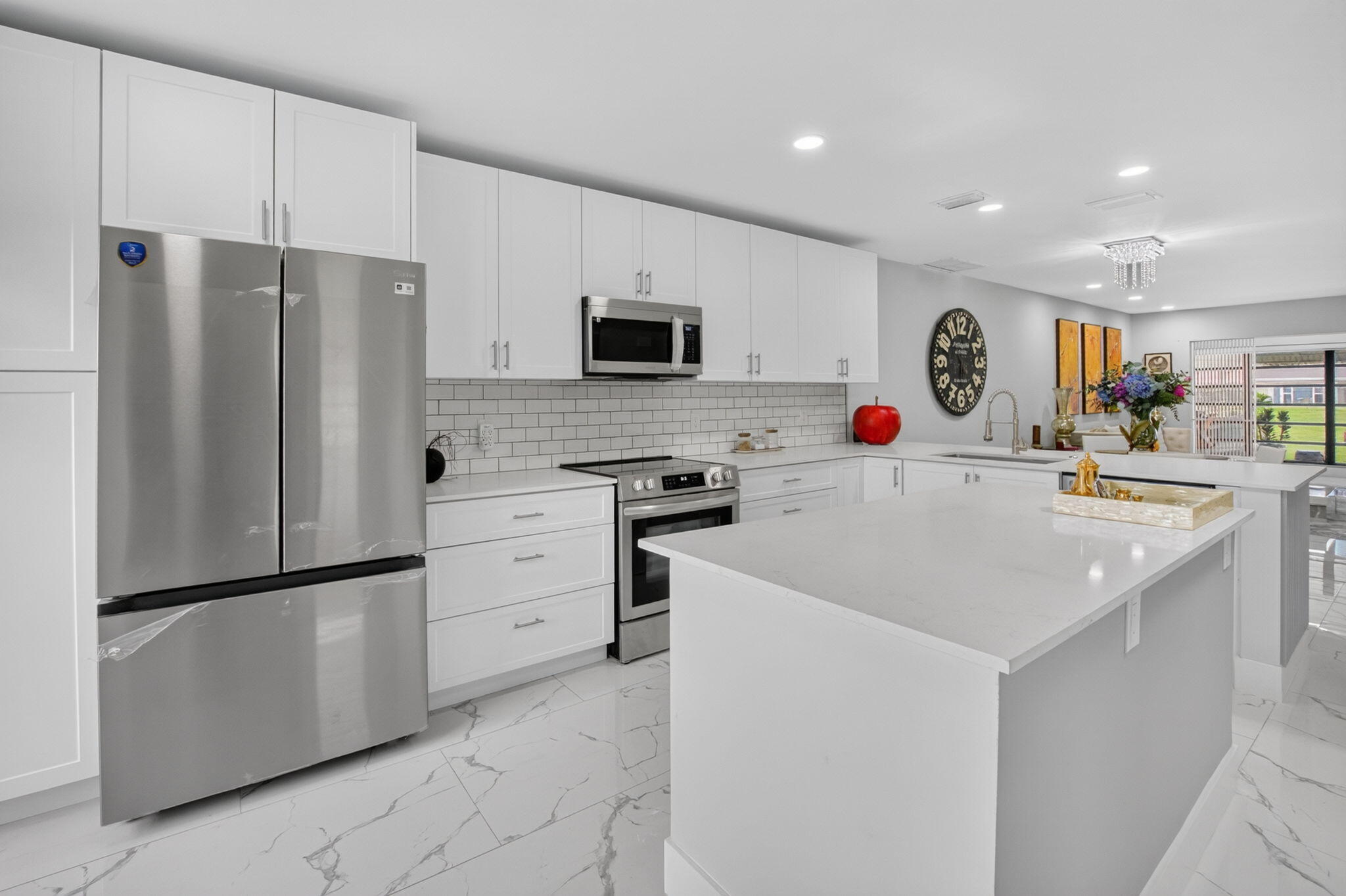 Foto de propiedad en 8967 Belle Aire Drive, Boca Raton, FL 33433 Boca Raton con MLS# 