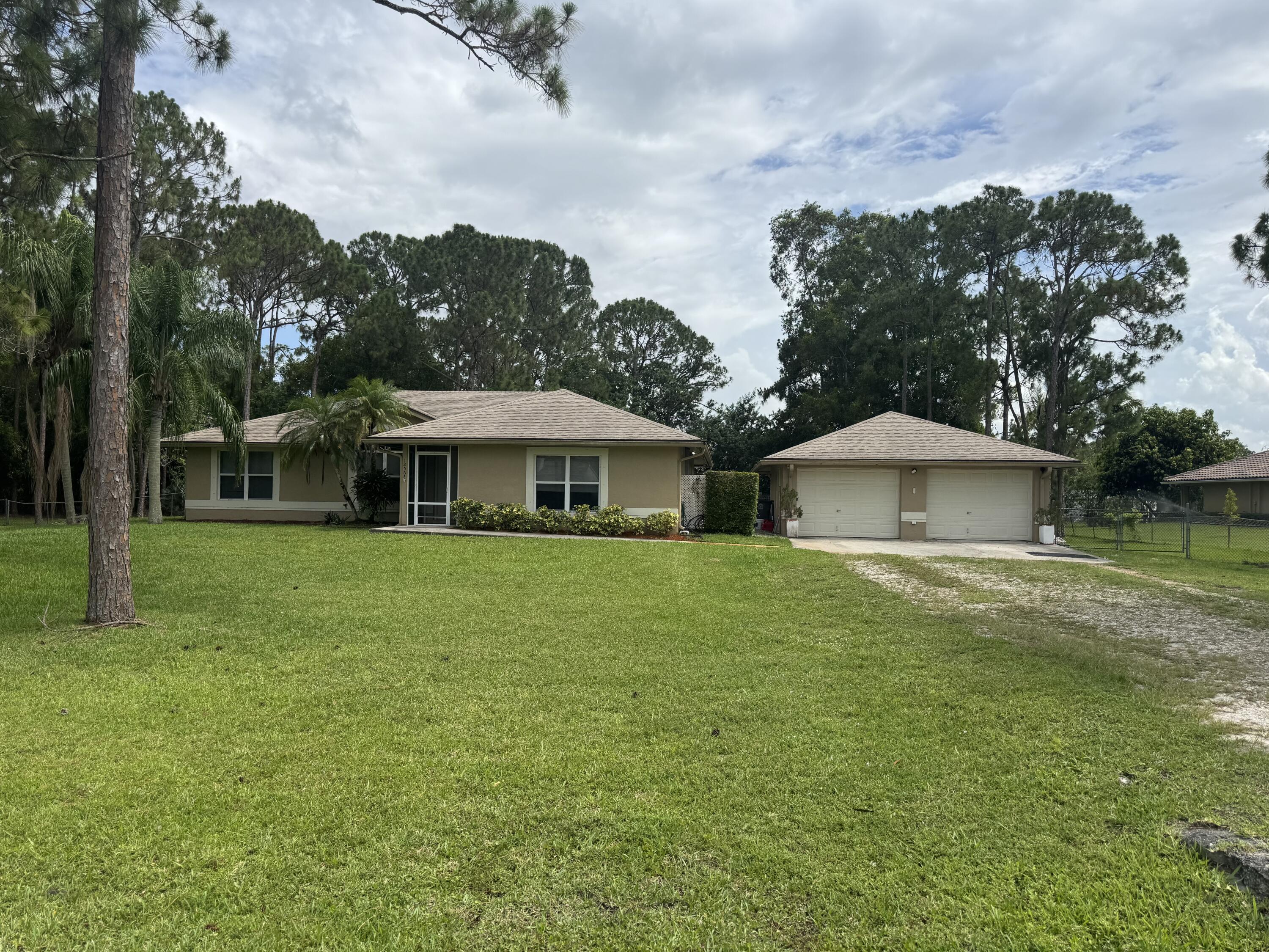 Foto de propiedad en 12564 68th Street N, West Palm Beach, FL 33412 West Palm Beach con MLS# 