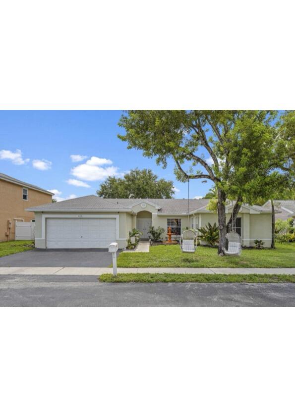 Foto de propiedad en 4021 SW 72ND Terrace, Davie, FL 33314 Davie con MLS# 