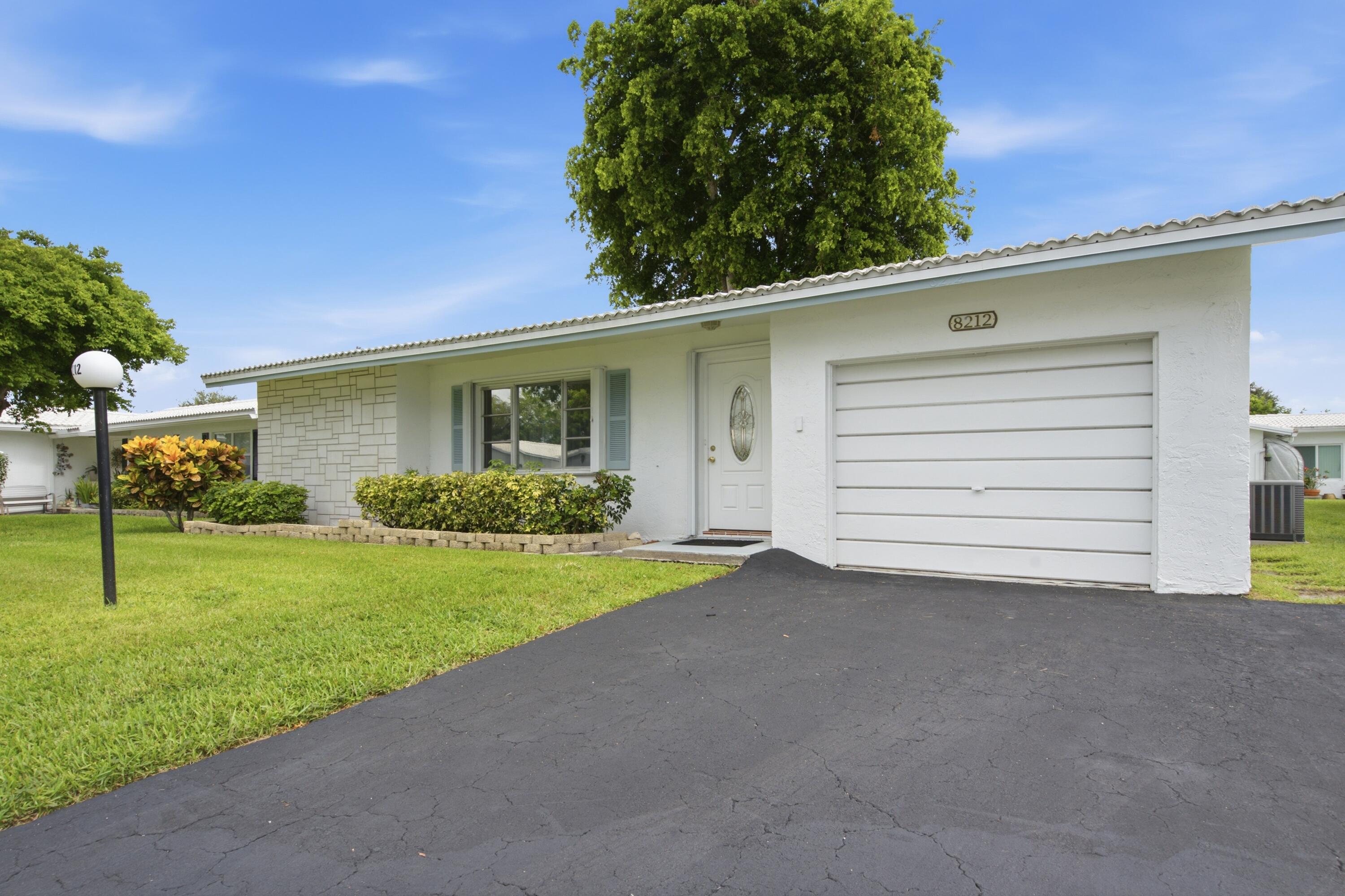 Foto de propiedad en 8212 NW 12th Court, Plantation, FL 33322 Plantation con MLS# 