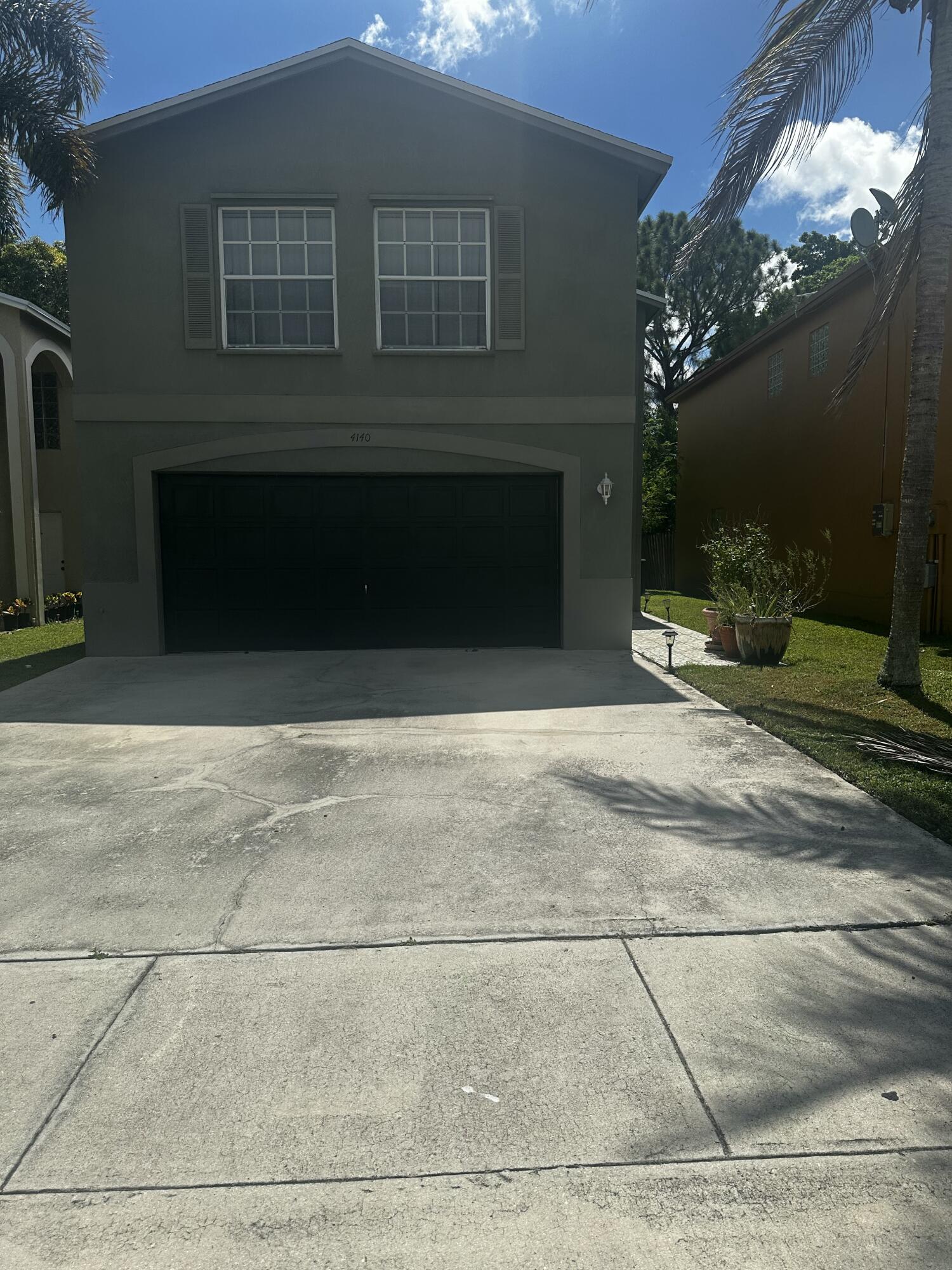 Foto de propiedad en 4140 Pine Hollow Circle, Greenacres, FL 33463 Greenacres con MLS# 
