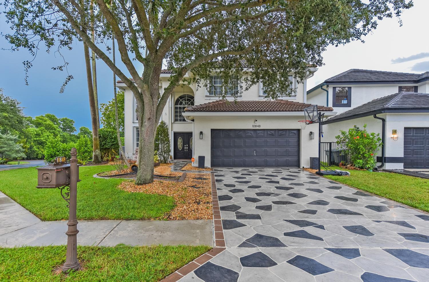 Foto de propiedad en 10848 Tamoron Lane, Boca Raton, FL 33498 Boca Raton con MLS# 