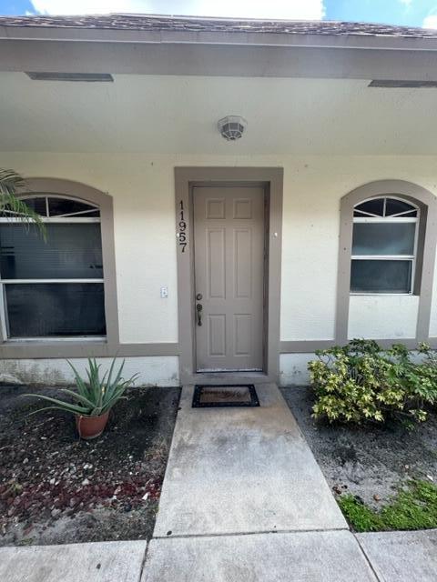 Foto de propiedad en 11957 Sturbridge Lane, Wellington, FL 33414 Wellington con MLS# 
