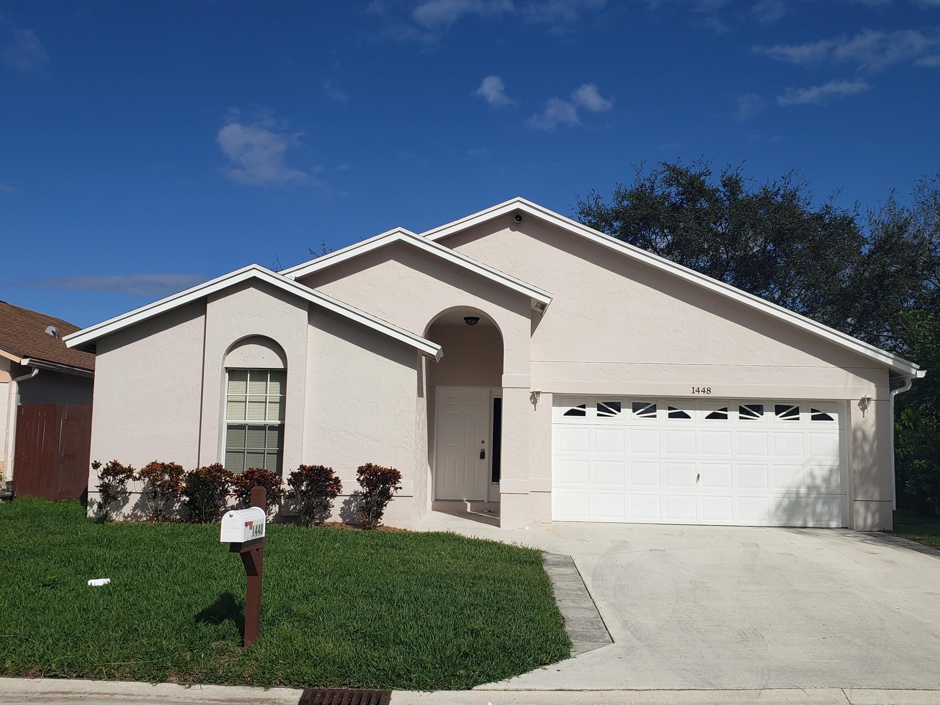 Foto de propiedad en 1448 Waterway Cove Drive, Wellington, FL 33414 Wellington con MLS# 