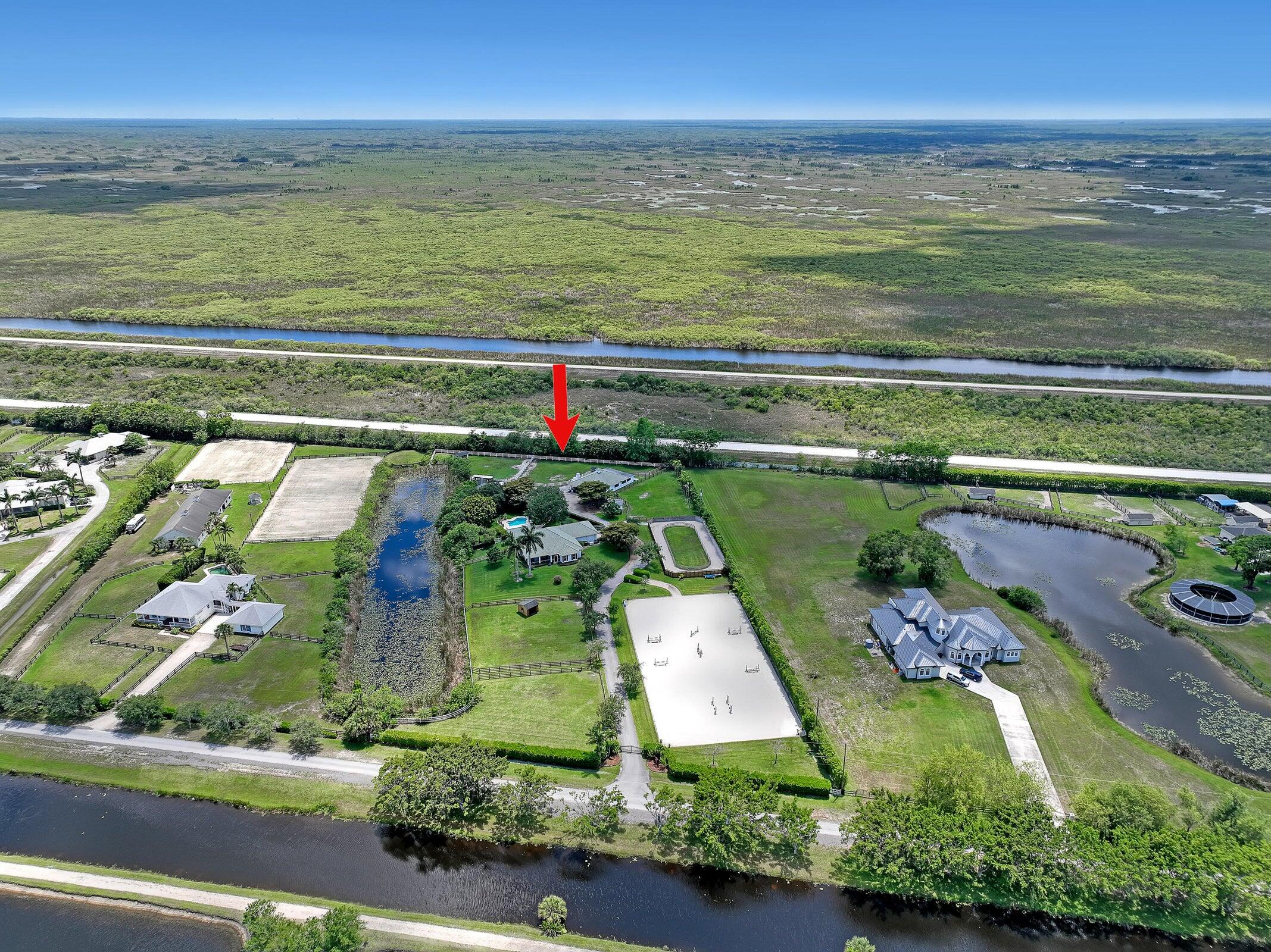 Foto de propiedad en 15560 46th Lane S, Wellington, FL 33414 Wellington con MLS# 