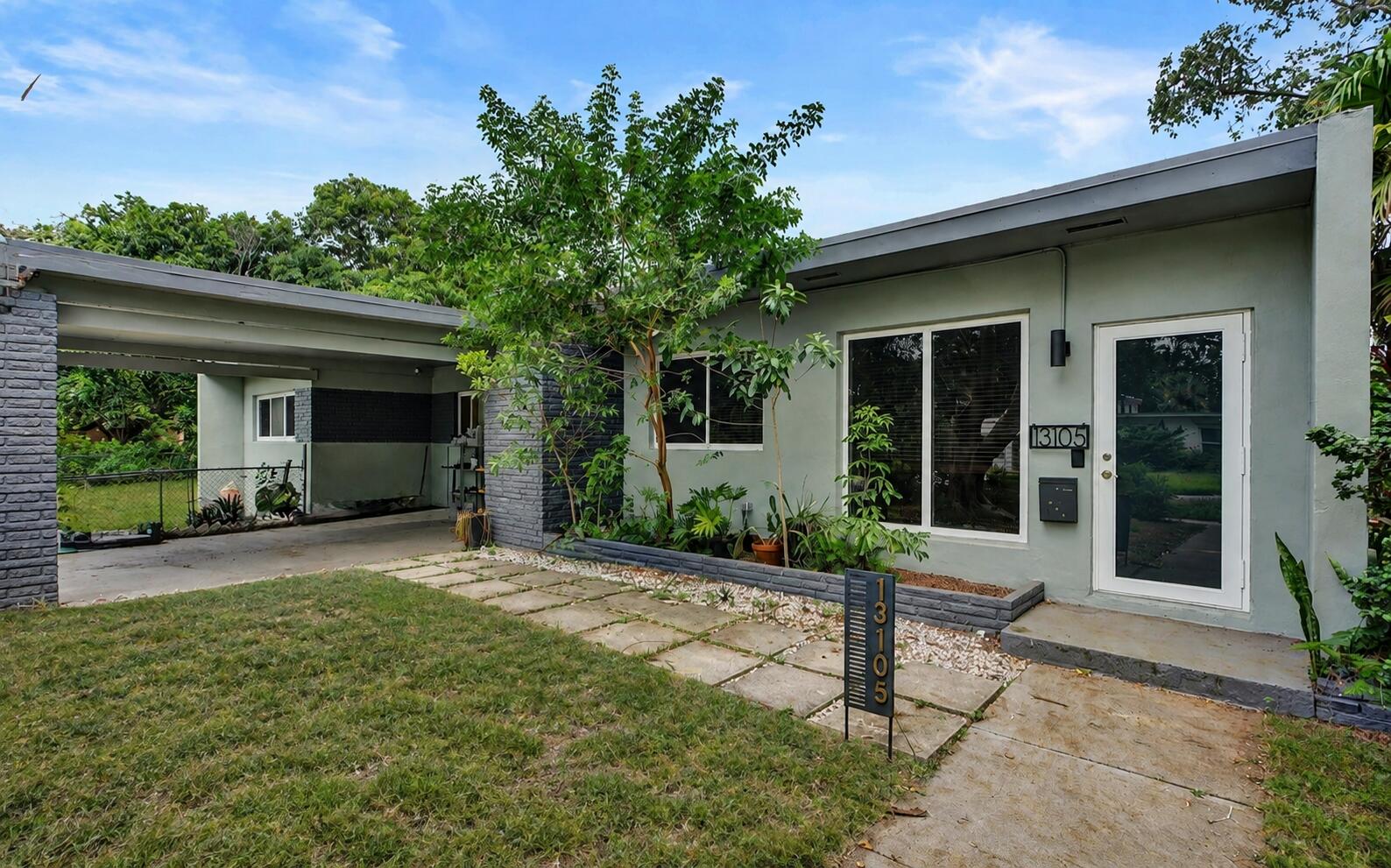 Charming 3 bedroom, 2 bath home with IMPACT WINDOWS!