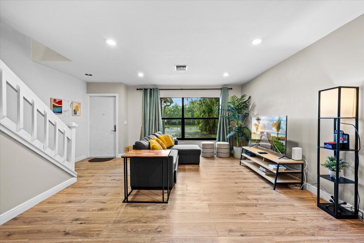 Foto de propiedad en 1602 MONTAUK Drive, Wellington, FL 33414 Wellington con MLS# 
