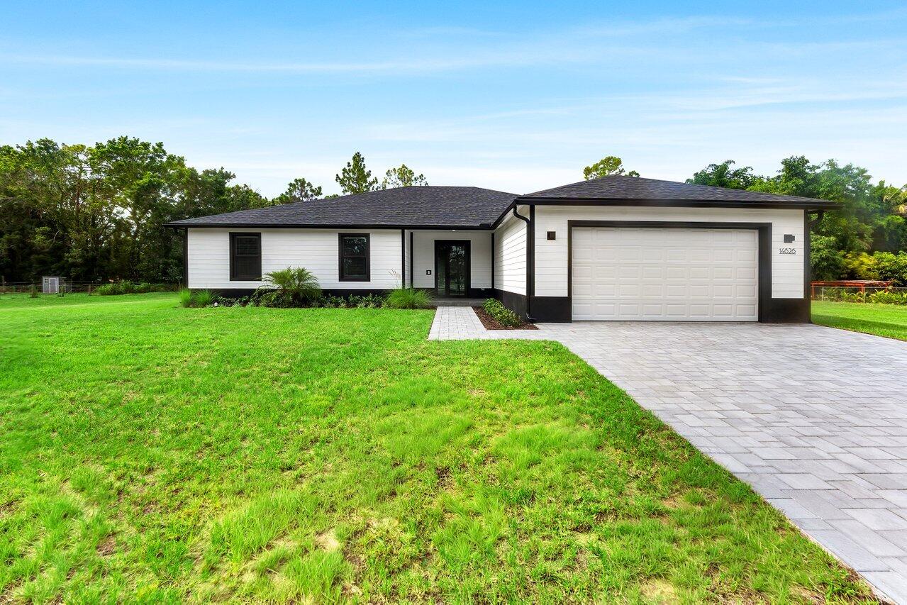 Foto de propiedad en 14826 89th Place N, Loxahatchee, FL 33470 Loxahatchee con MLS# 