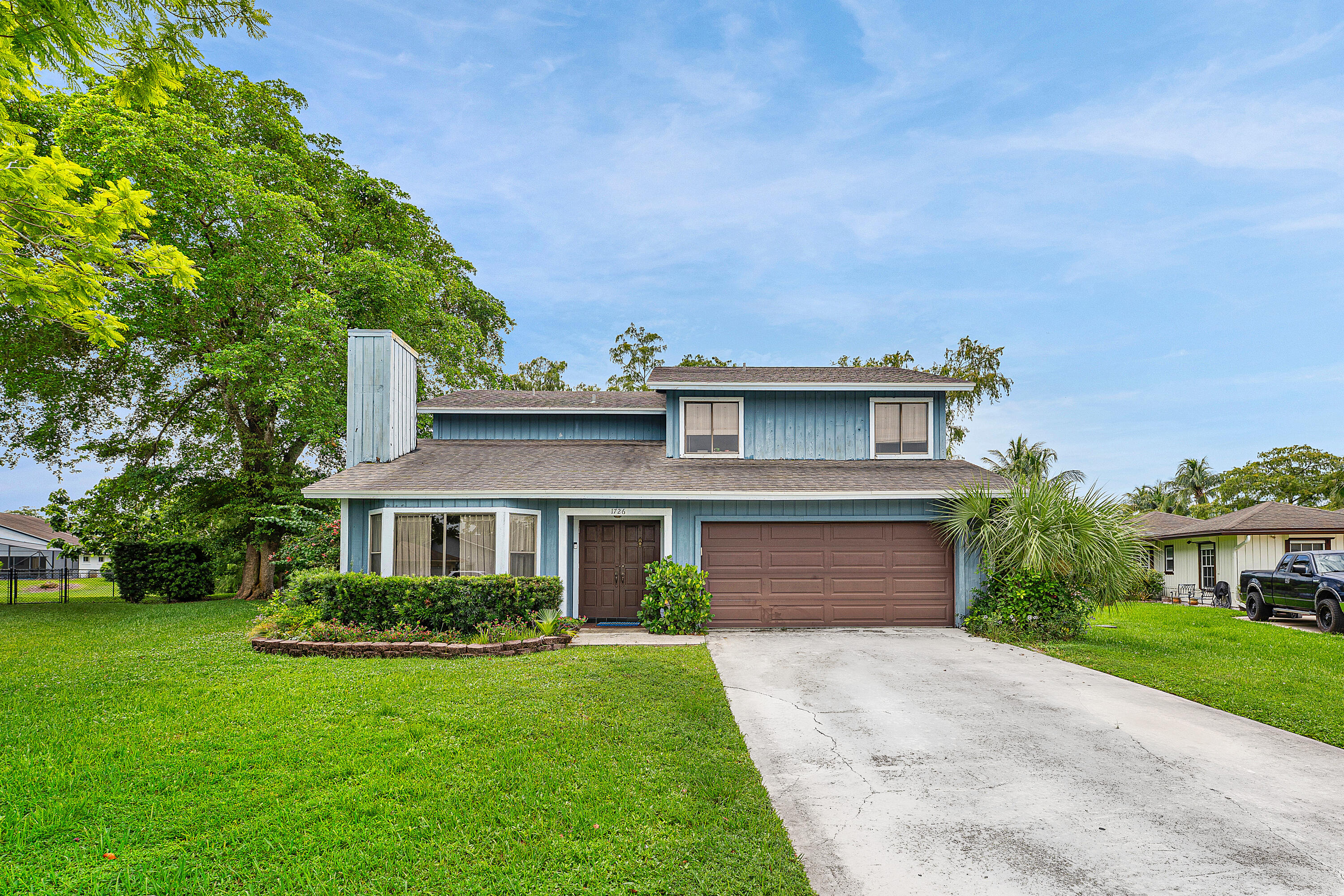 Foto de propiedad en 1726 TREEHAVEN Court, Wellington, FL 33414 Wellington con MLS# 