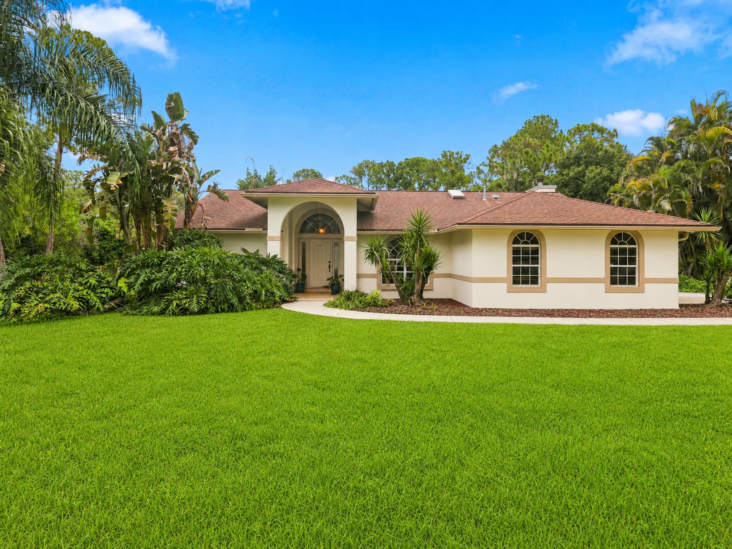 Foto de propiedad en 11389 150TH Court N, Jupiter Farms, FL 33478 Jupiter Farms con MLS# 