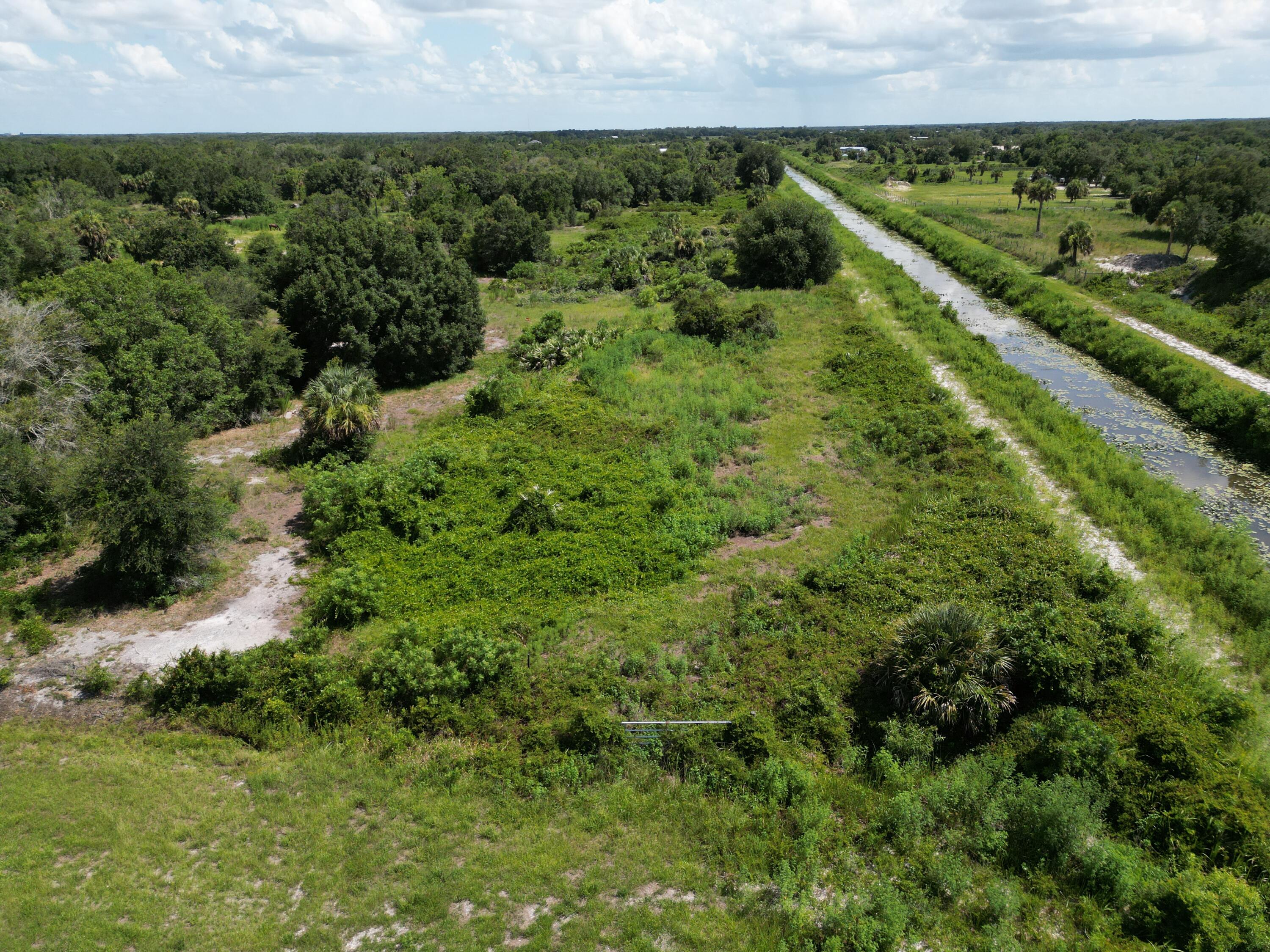 Foto de propiedad en 18396 NW 284TH Street, Okeechobee, FL 34972 Okeechobee con MLS# 
