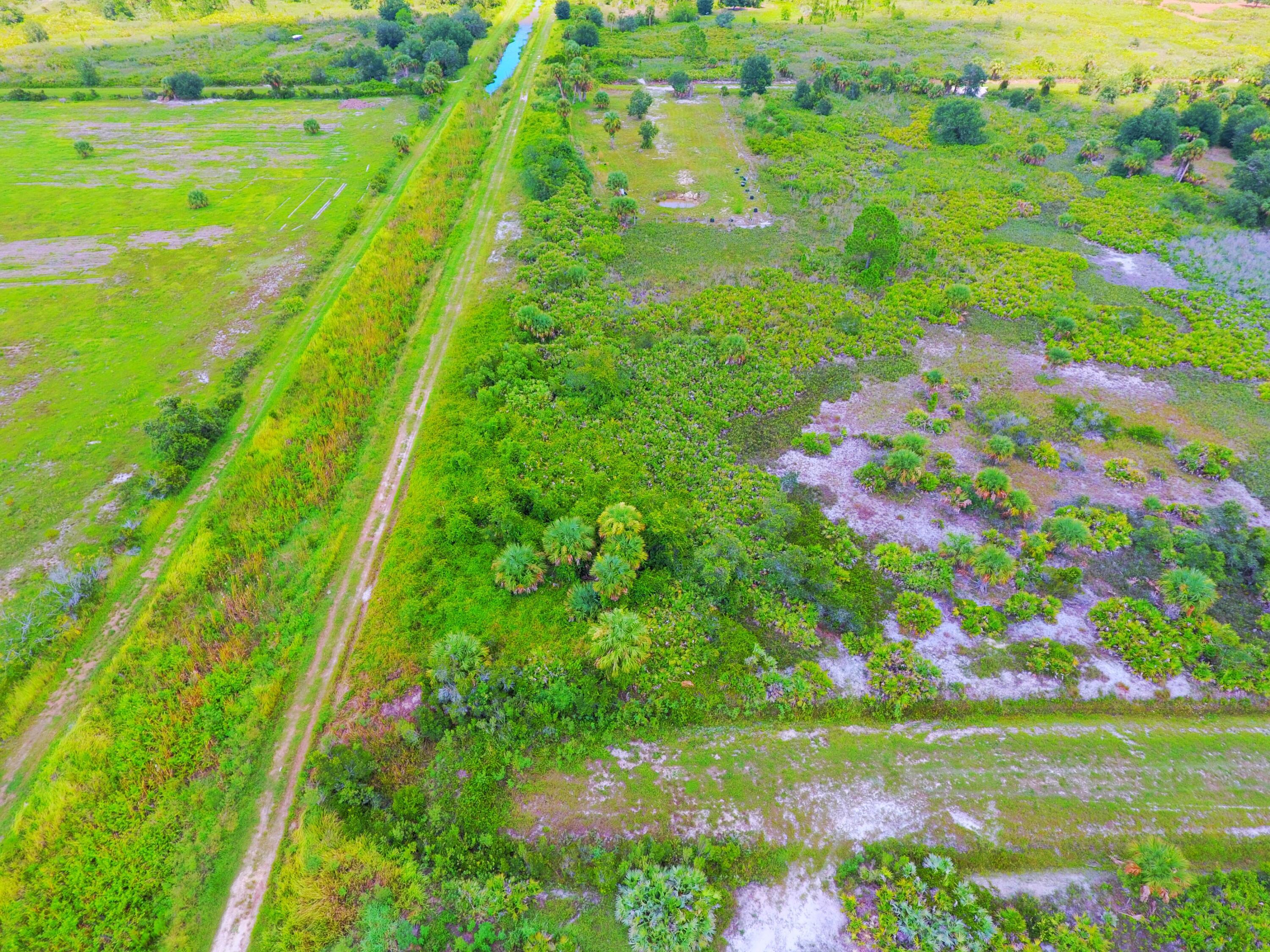 Foto de propiedad en 21591 NW 282ND Street, Okeechobee, FL 34972 Okeechobee con MLS# 