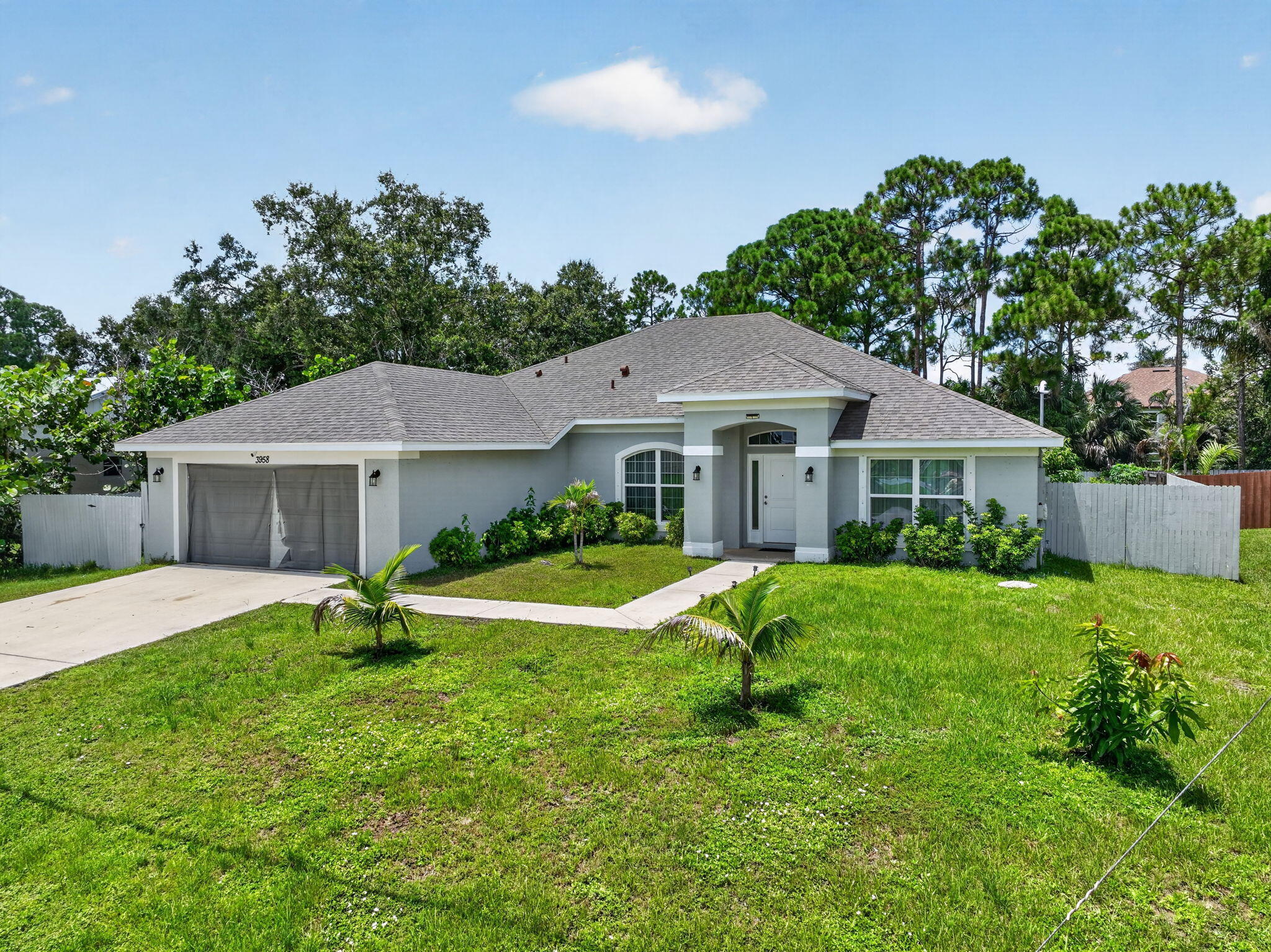 Foto de propiedad en 3958 SW BRUNSWICK Street, Port St. Lucie, FL 34953 Port St. Lucie con MLS# 