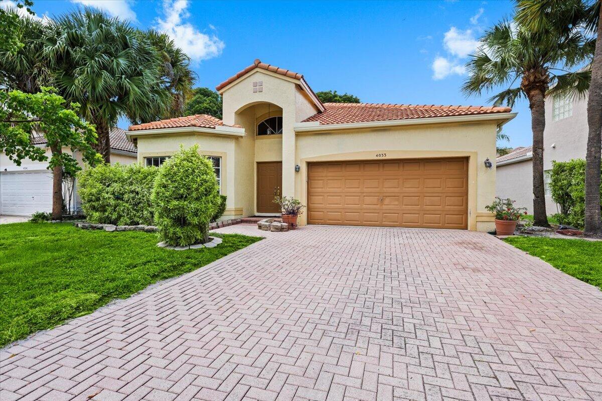 Foto de propiedad en 4033 NW 62nd Court, Coconut Creek, FL 33073 Coconut Creek con MLS# 
