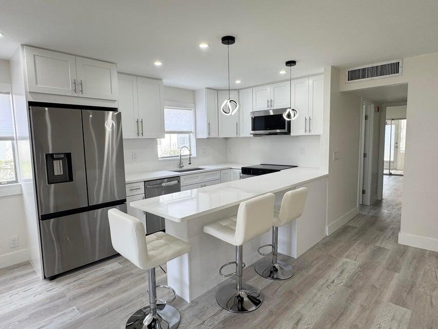 Foto de propiedad en 108 BRITTANY Terrace C, Delray Beach, FL 33446 Delray Beach con MLS# 