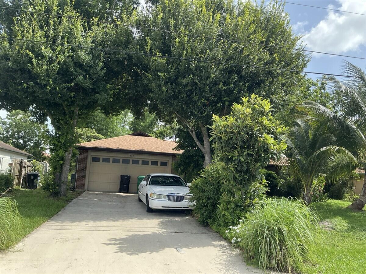 Foto de propiedad en 1867 SW FEARS Avenue, Port St. Lucie, FL 34953 Port St. Lucie con MLS# 