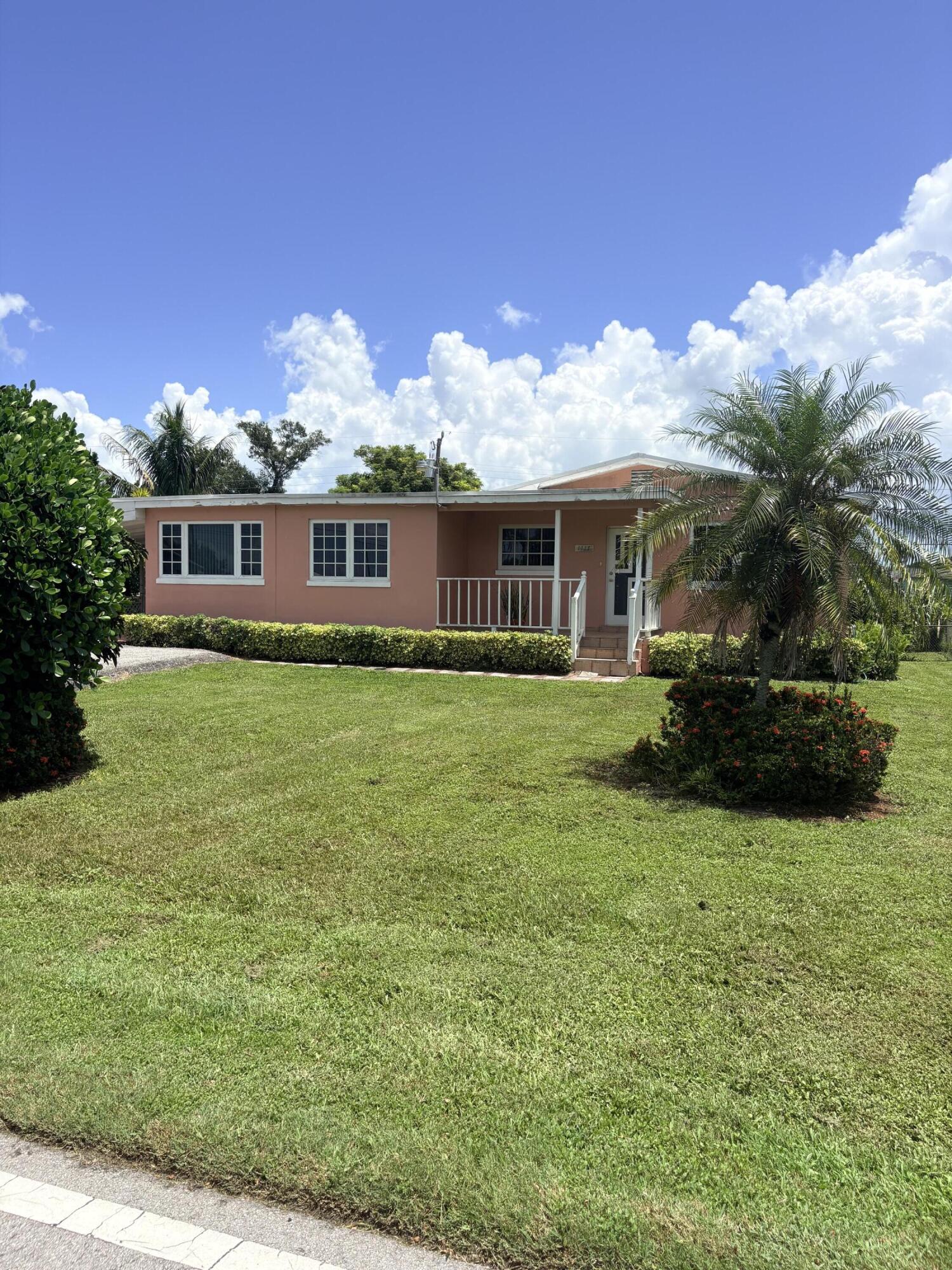 Foto de propiedad en 1117 NE 23RD Street, Belle Glade, FL 33430 Belle Glade con MLS# 
