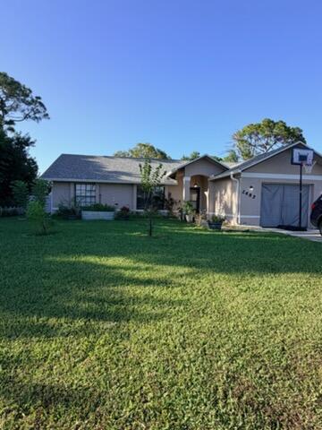 Foto de propiedad en 2685 SE MARIPOSA Avenue, Port St. Lucie, FL 34952 Port St. Lucie con MLS# 