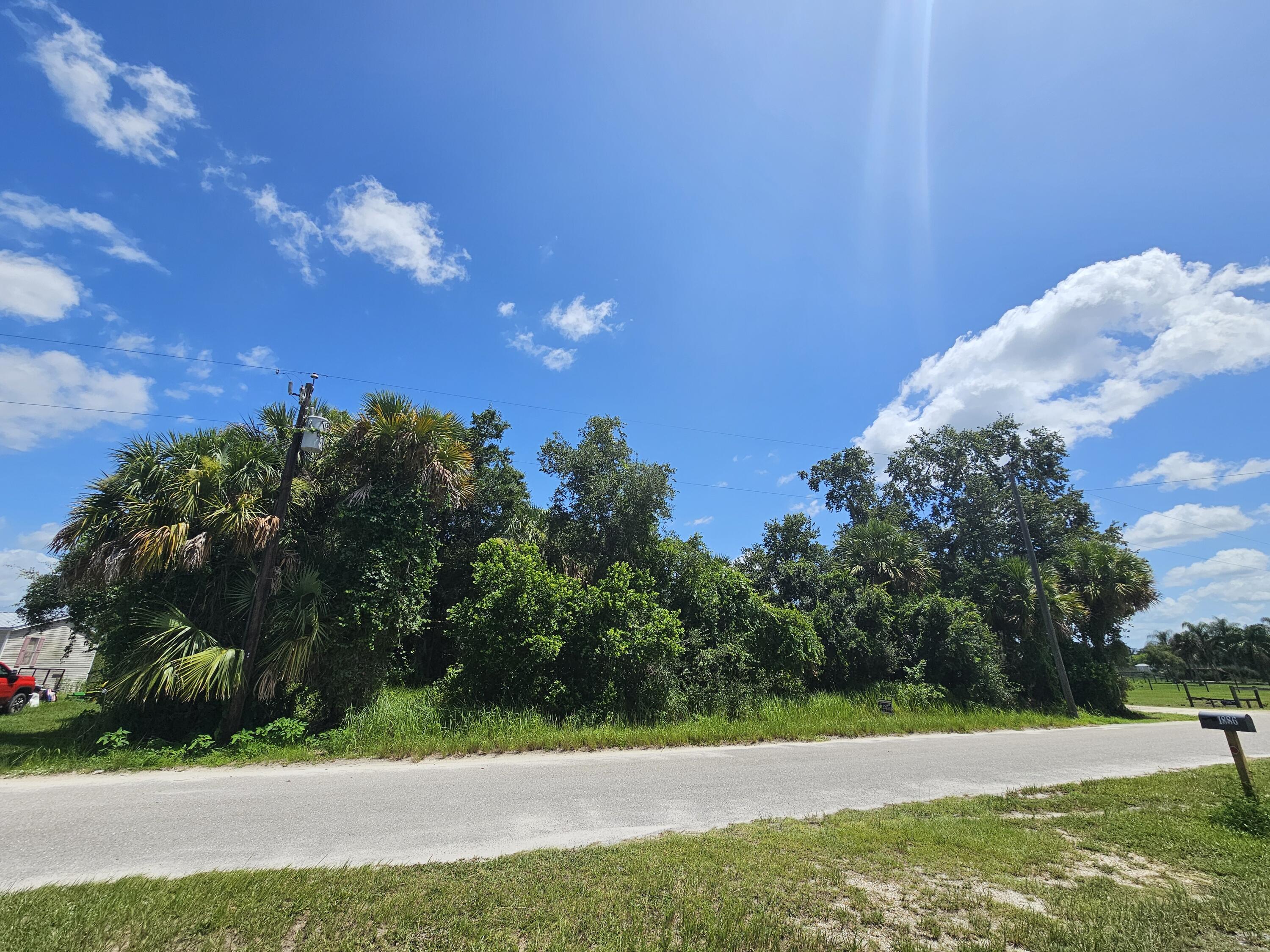 Foto de propiedad en 1875 NE 308th Street, Okeechobee, FL 34972 Okeechobee con MLS# 