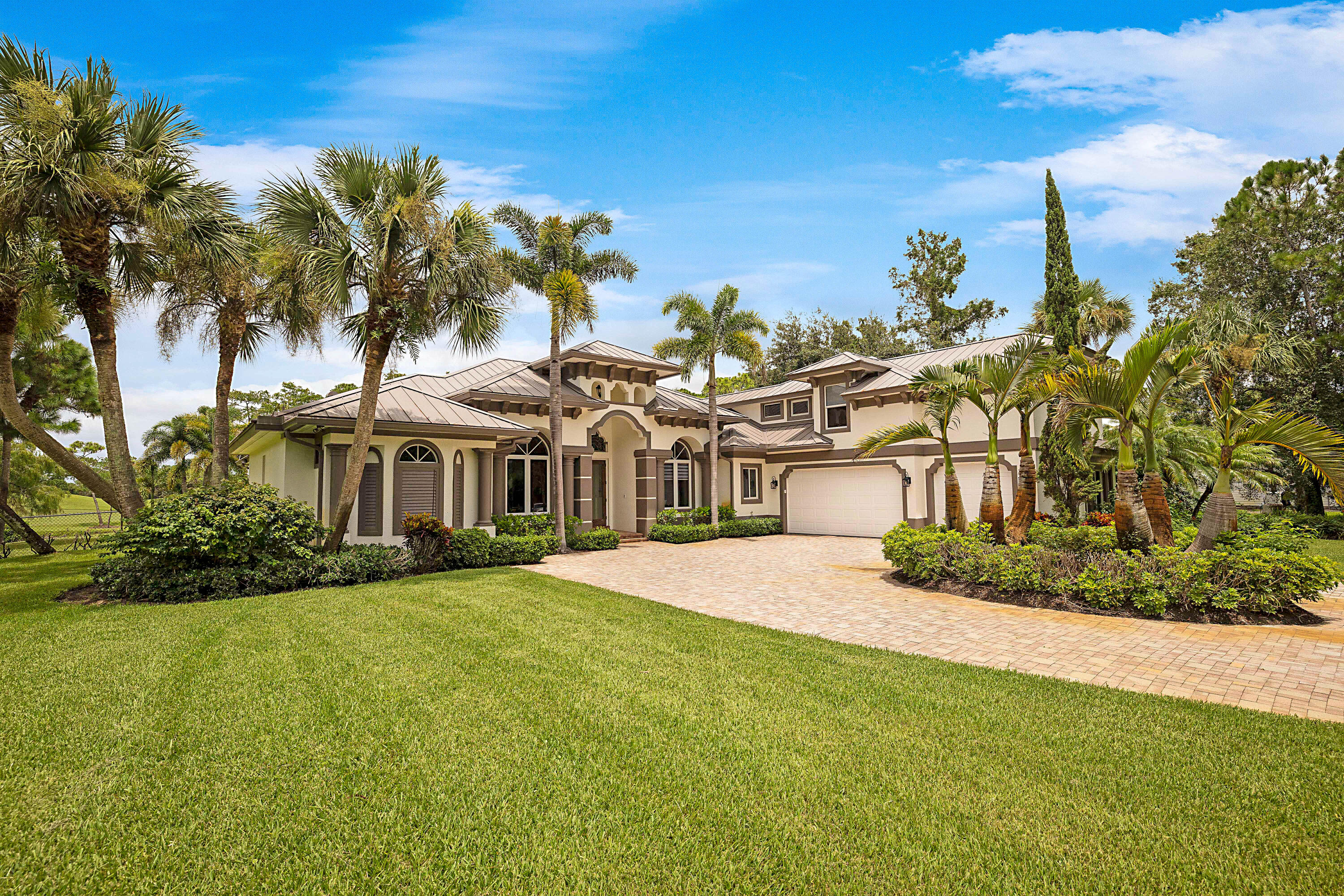Brick paver drive and 3 Car Garage