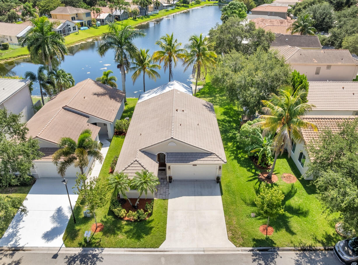 Foto de propiedad en 4912 NW 55TH Boulevard, Coconut Creek, FL 33073 Coconut Creek con MLS# 