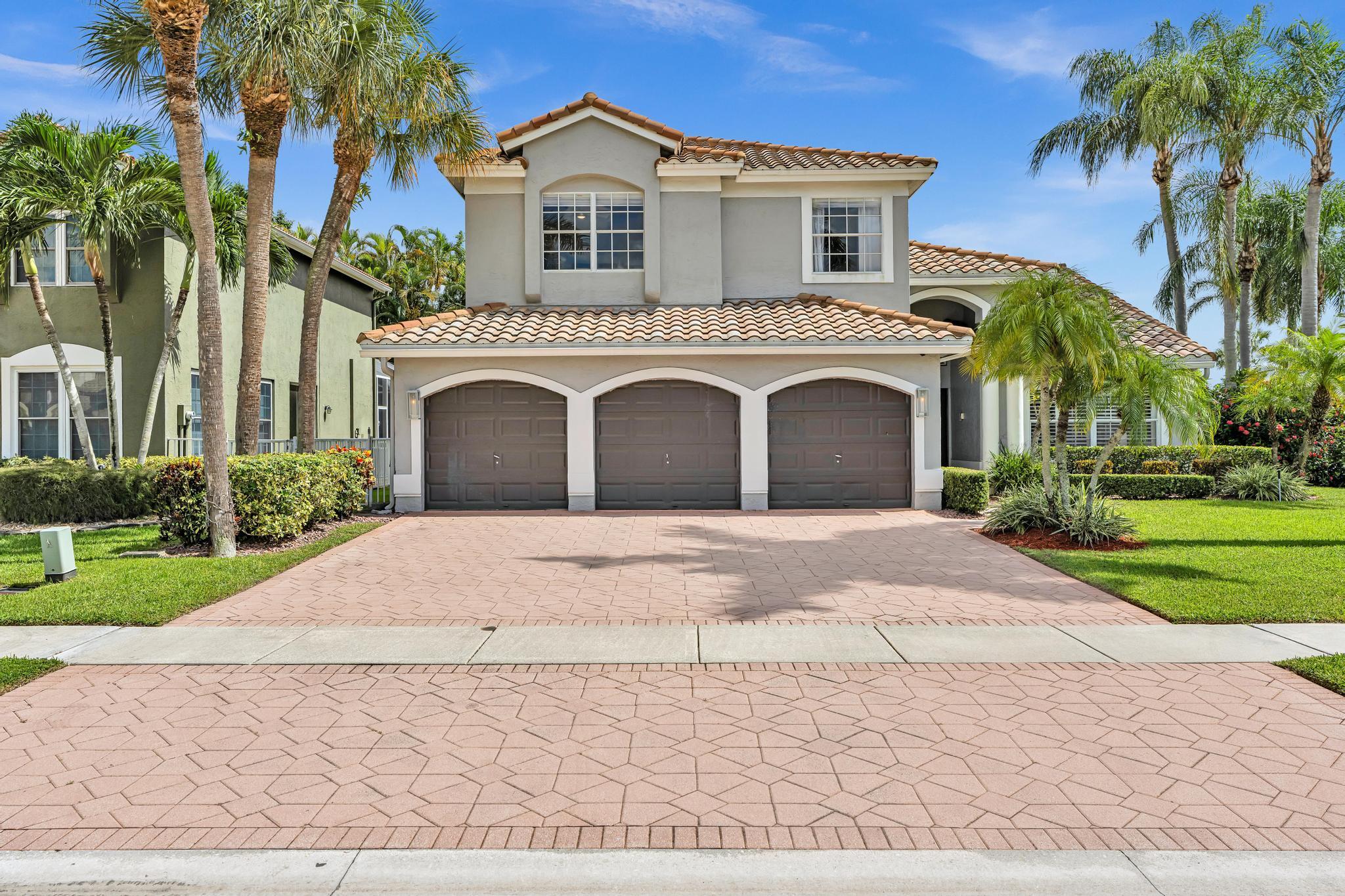 Foto de propiedad en 10823 Tea Olive Lane, Boca Raton, FL 33498 Boca Raton con MLS# 