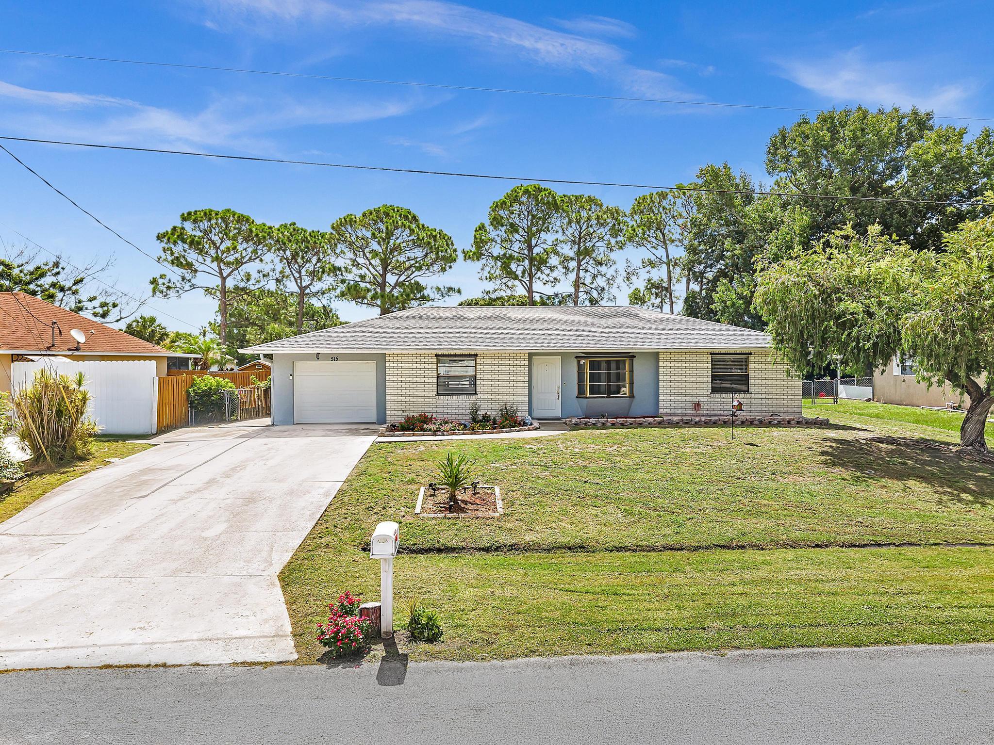 Foto de propiedad en 515 NW Twylite Terrace, Port St. Lucie, FL 34983 Port St. Lucie con MLS# 