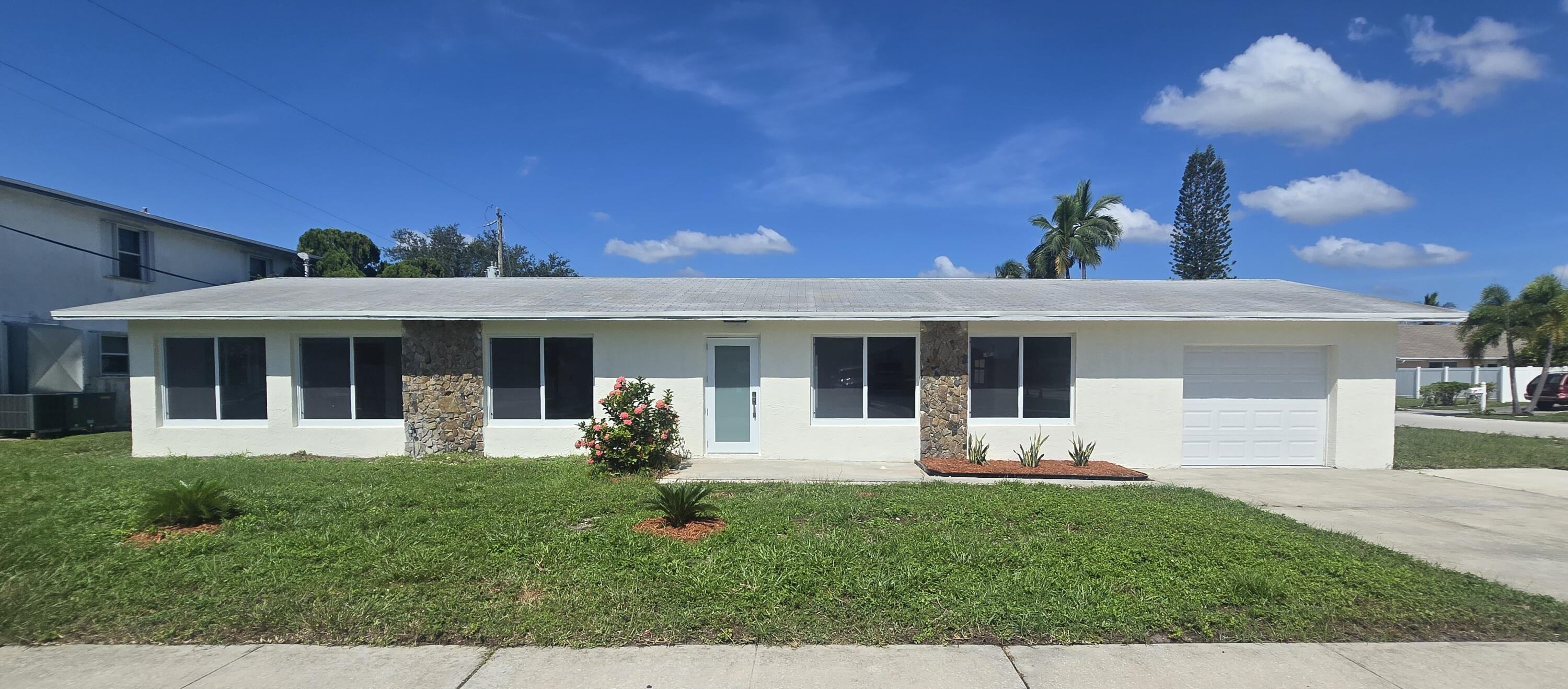 Foto de propiedad en 303 SW 33RD Terrace, Deerfield Beach, FL 33442 Deerfield Beach con MLS# 