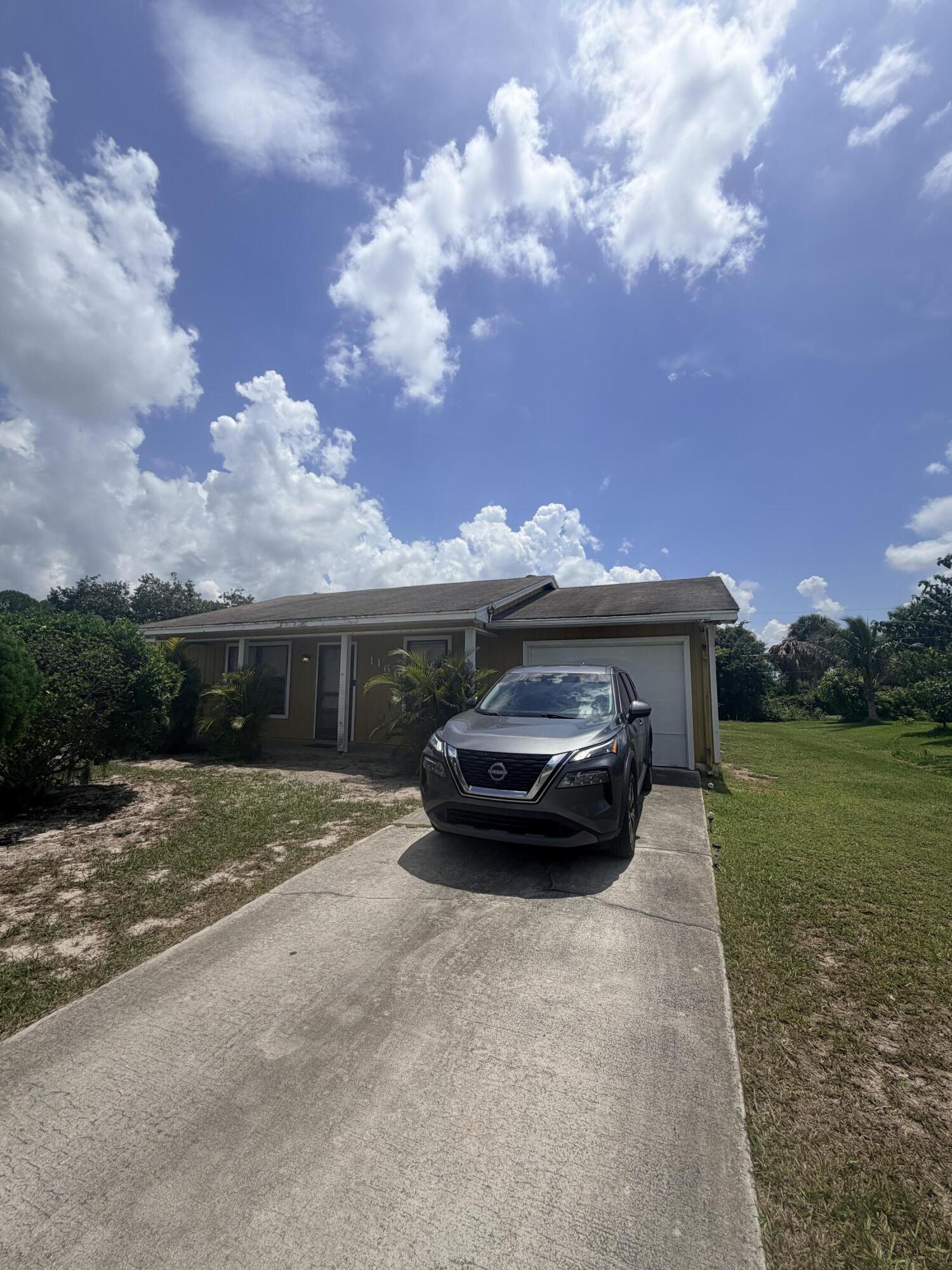 Foto de propiedad en 1166 SW ELEUTHERA Avenue, Port St. Lucie, FL 34953 Port St. Lucie con MLS# 