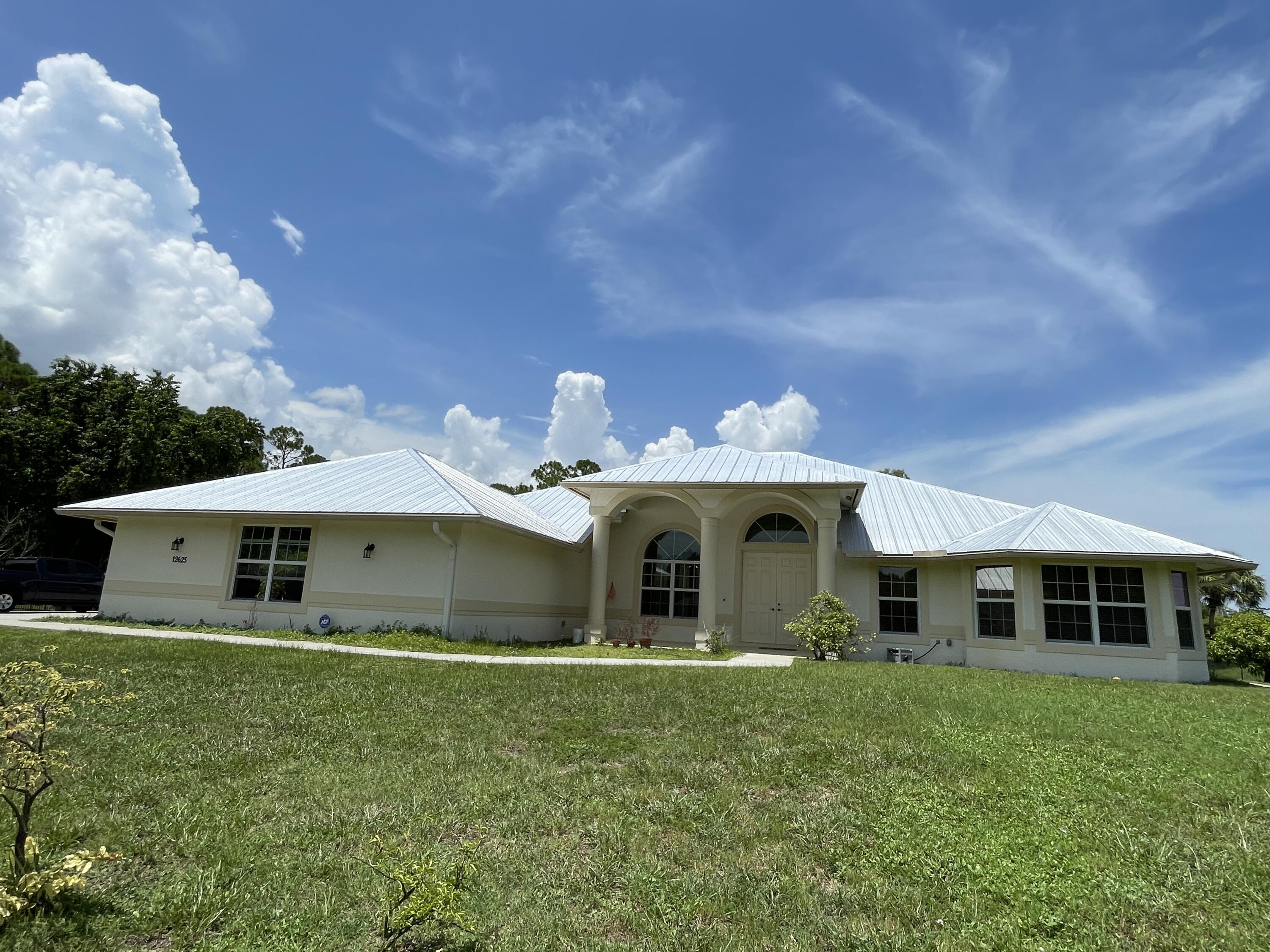 Foto de propiedad en 12625 88TH Place N, The Acreage, FL 33412 The Acreage con MLS# 