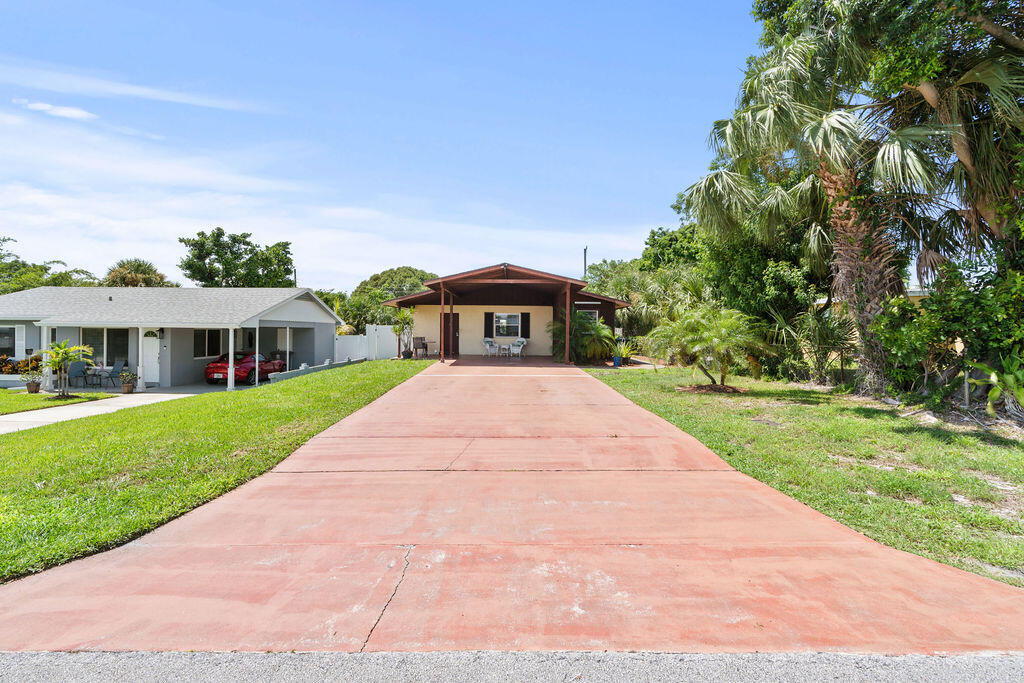 Foto de propiedad en 1102 Florence Road, Lantana, FL 33462 Lantana con MLS# 