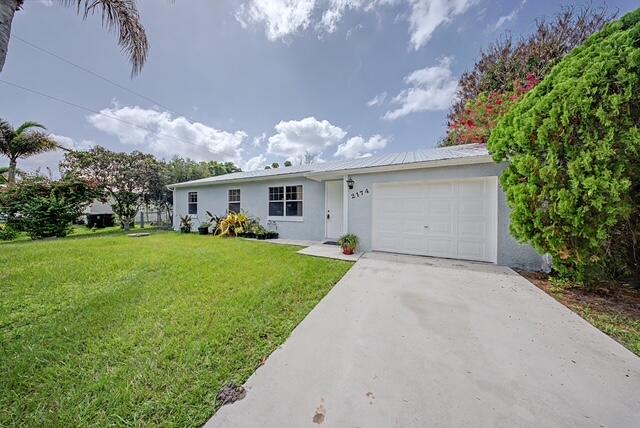 Foto de propiedad en 2174 SE Broward Terrace, Port St. Lucie, FL 34952 Port St. Lucie con MLS# 