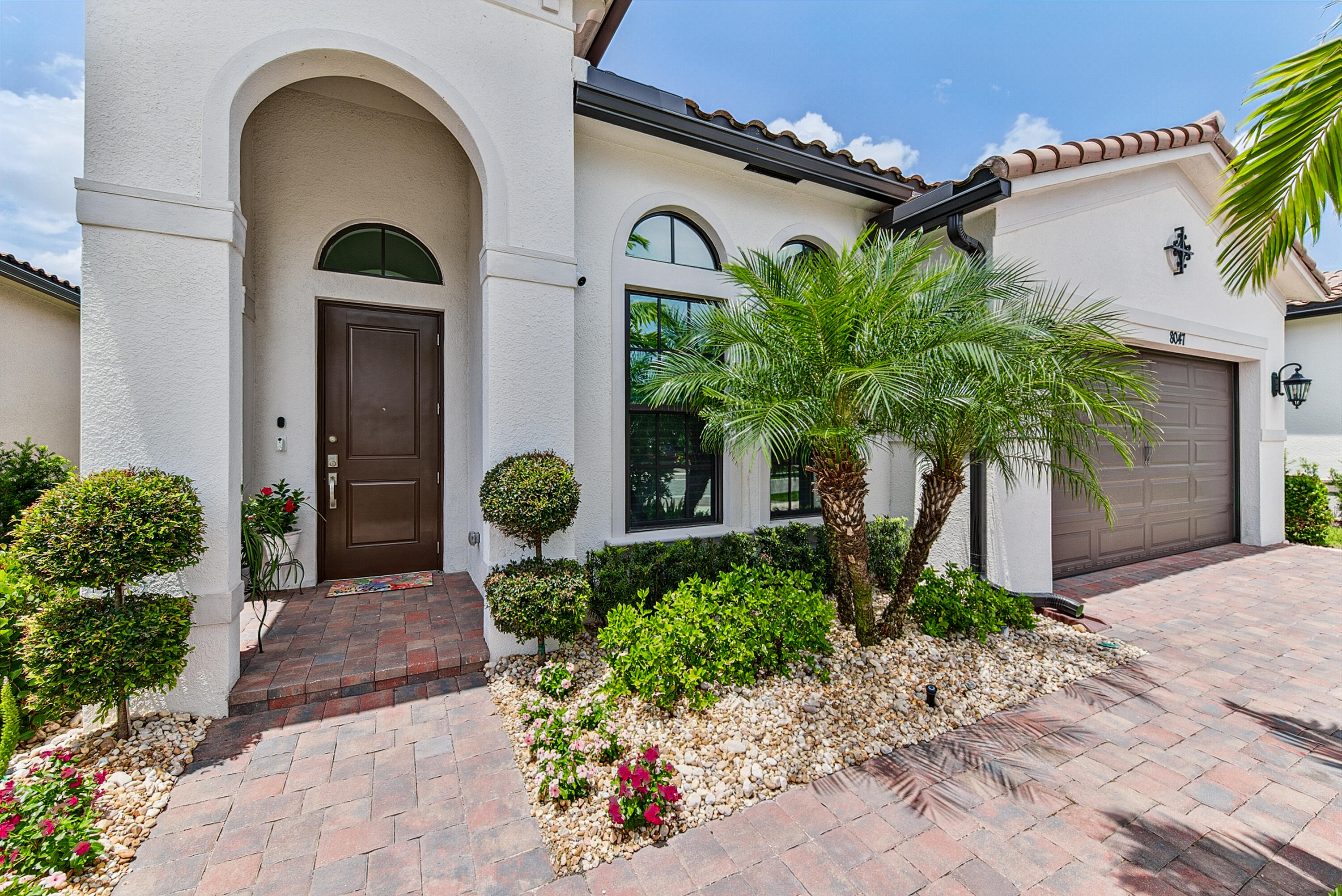 Foto de propiedad en 8047 JUNIPER Drive, Parkland, FL 33067 Parkland con MLS# 