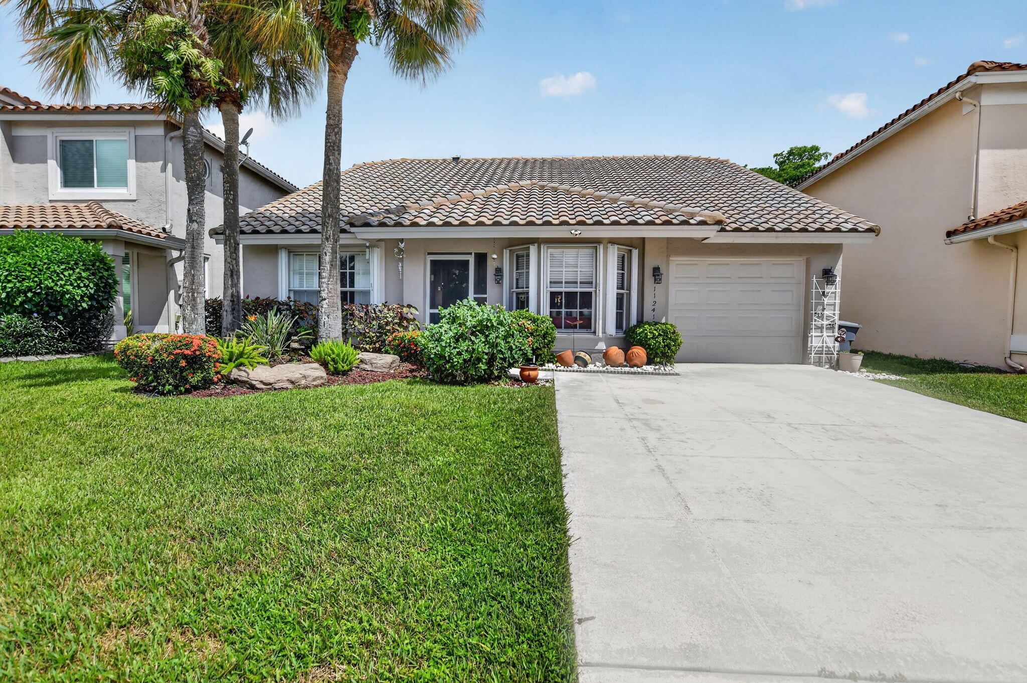 Foto de propiedad en 11241 Coral Reef Drive, Boca Raton, FL 33498 Boca Raton con MLS# 
