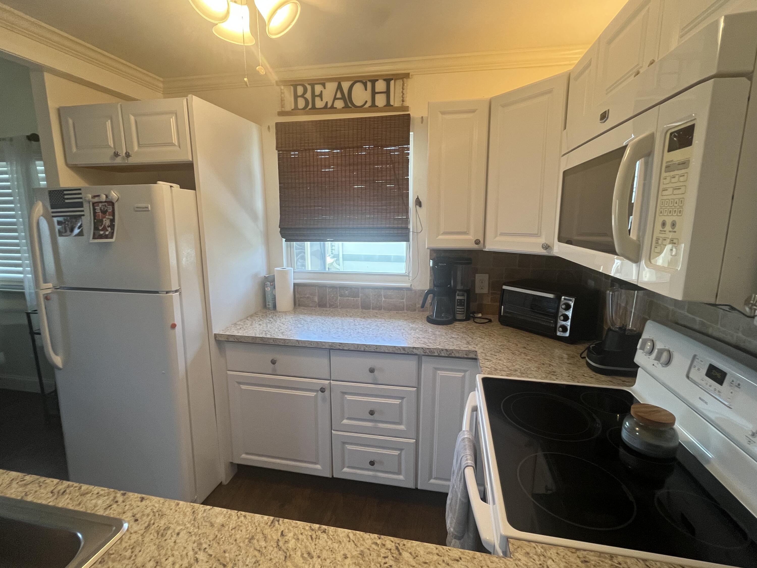 white shaker cabinets and updated kitchen