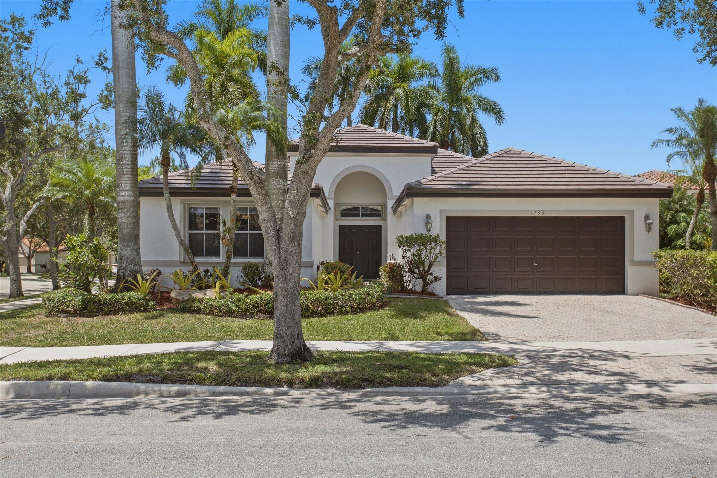 Foto de propiedad en 1285 WINDSOR Lane, Weston, FL 33327 Weston con MLS# 