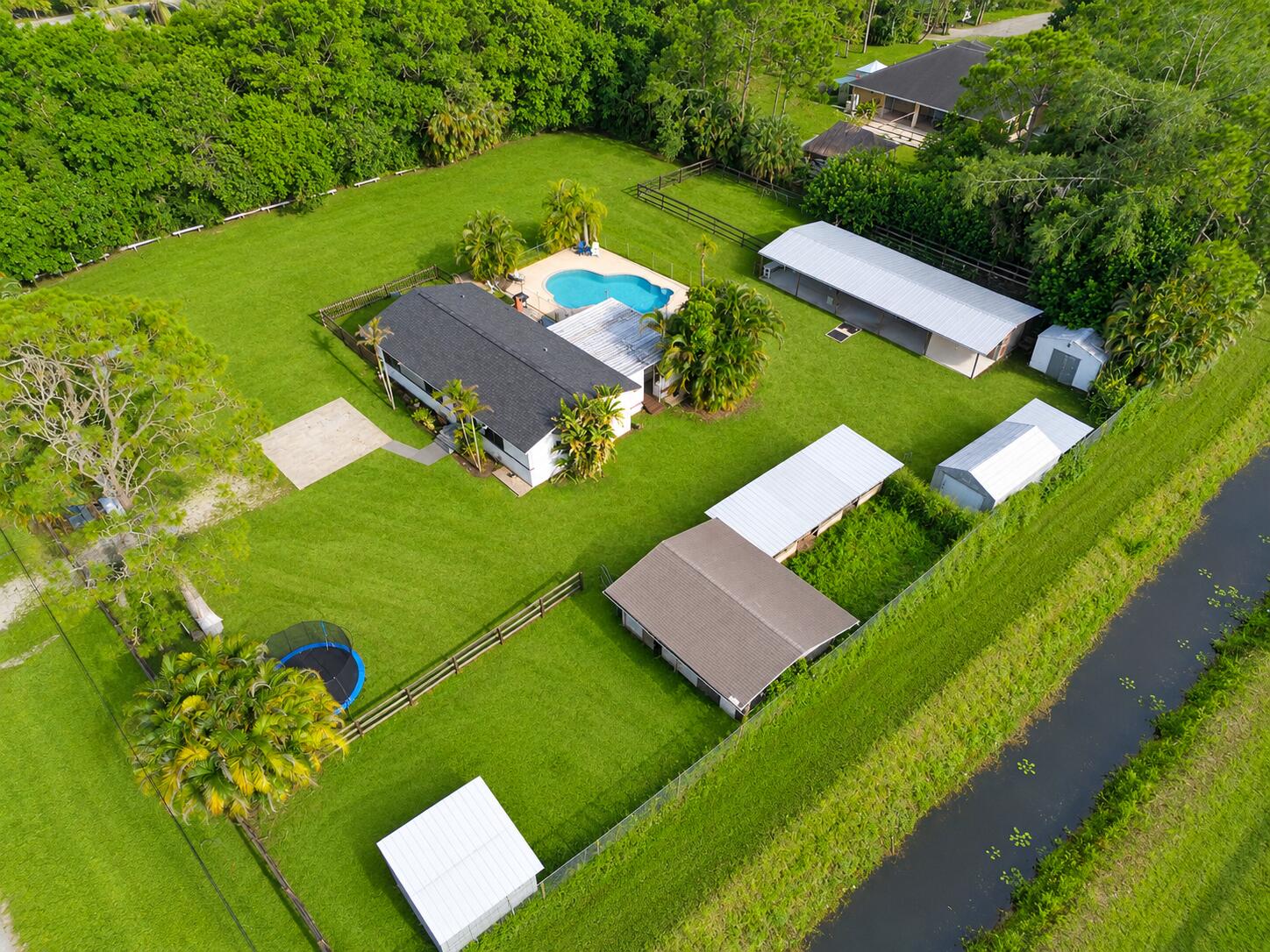 Foto de propiedad en 12230 63RD Lane N, The Acreage, FL 33412 The Acreage con MLS# 